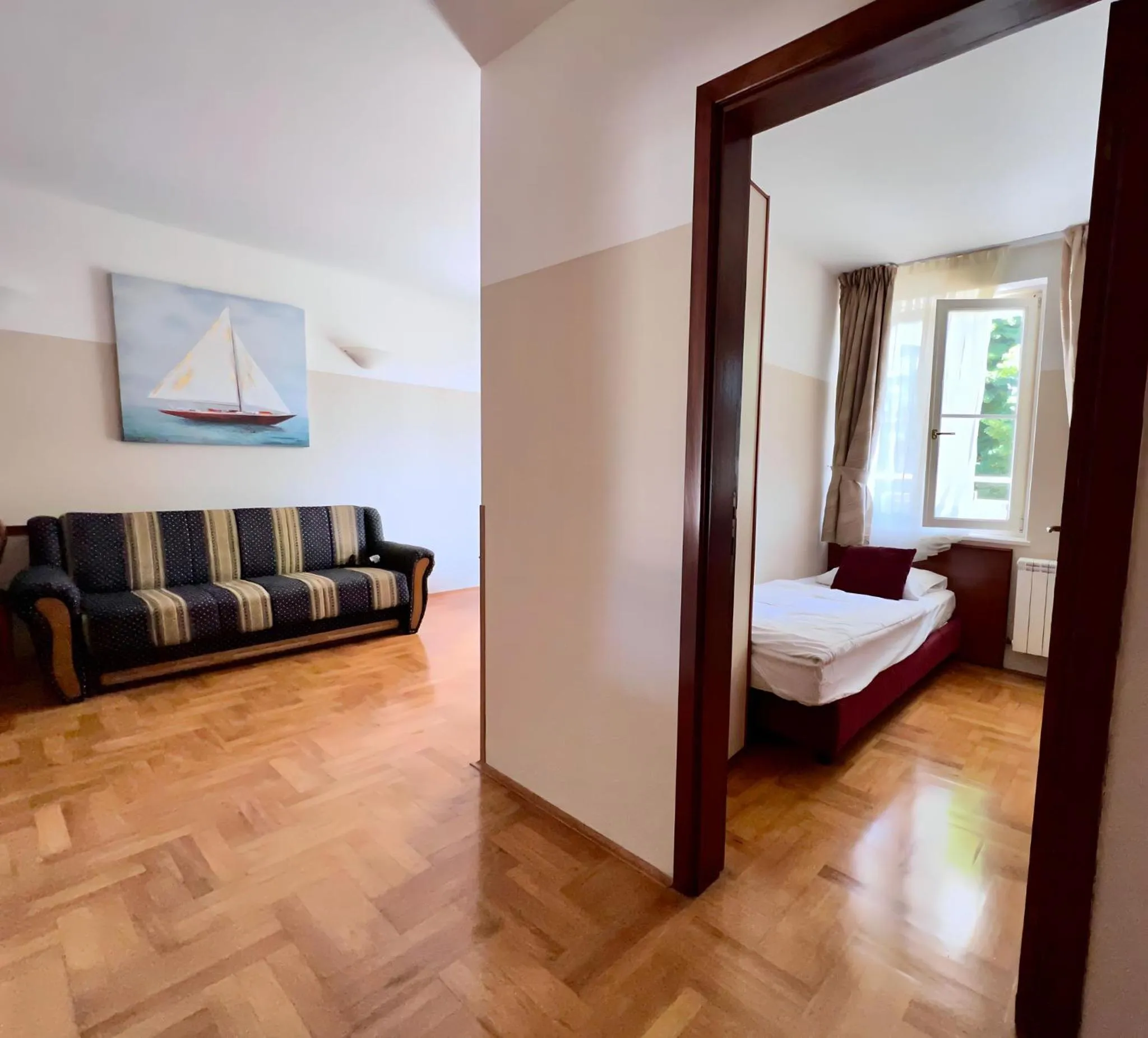 Seating area, Bed in Villa Valdepian Apartments
