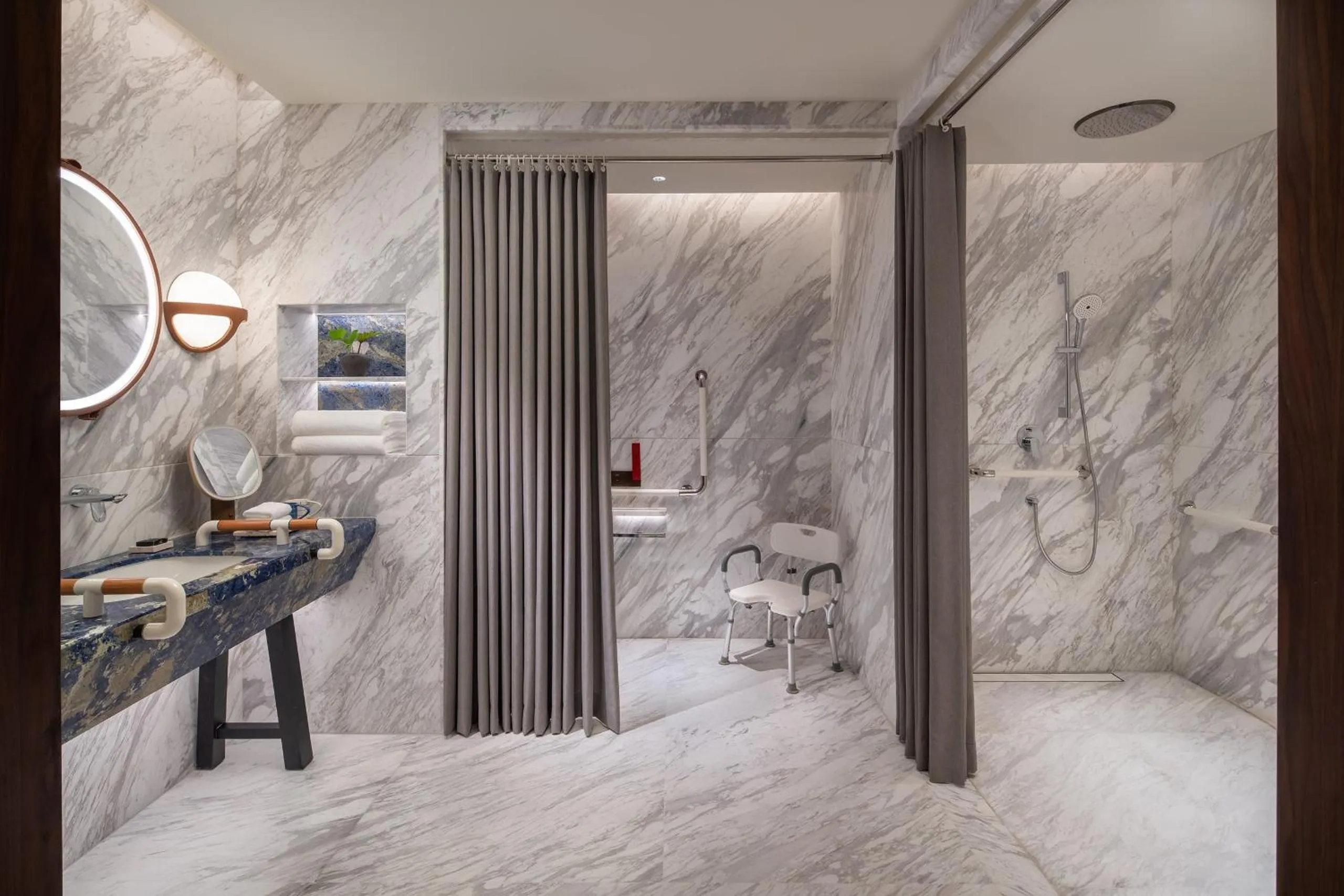 Bathroom in Kimpton Aqeos Hainan by IHG