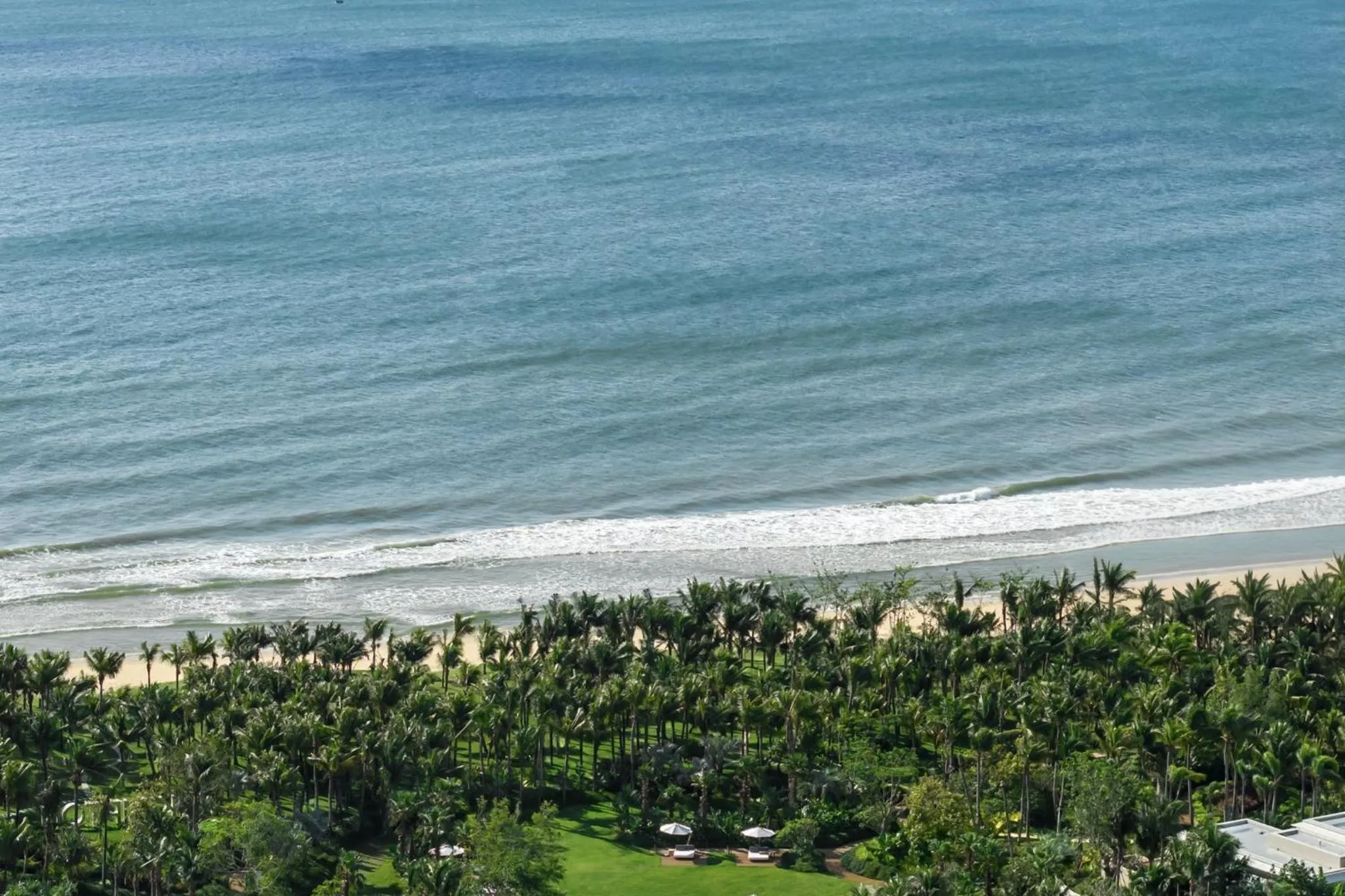 Beach in Kimpton Aqeos Hainan by IHG