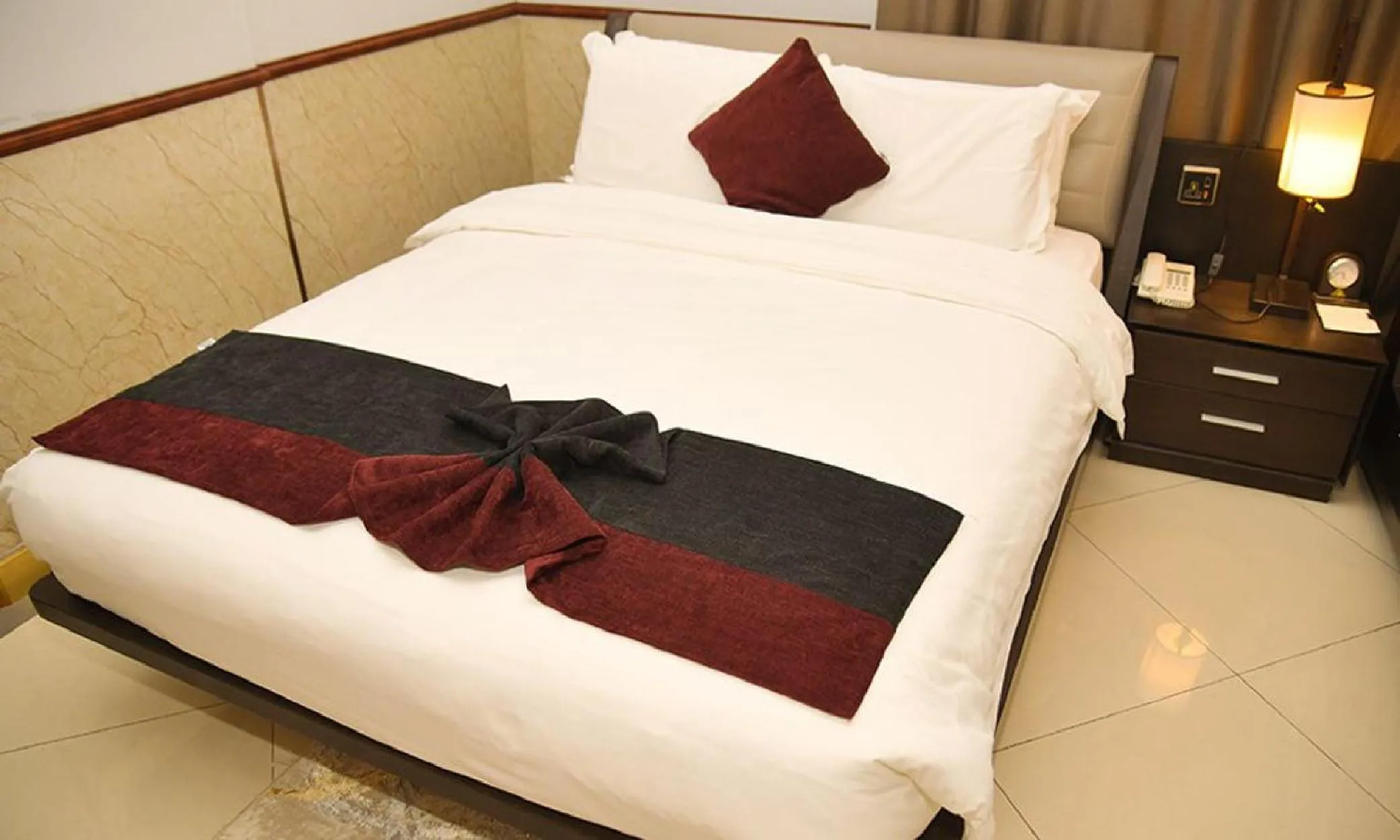 Bed in Claridge Star Hotel