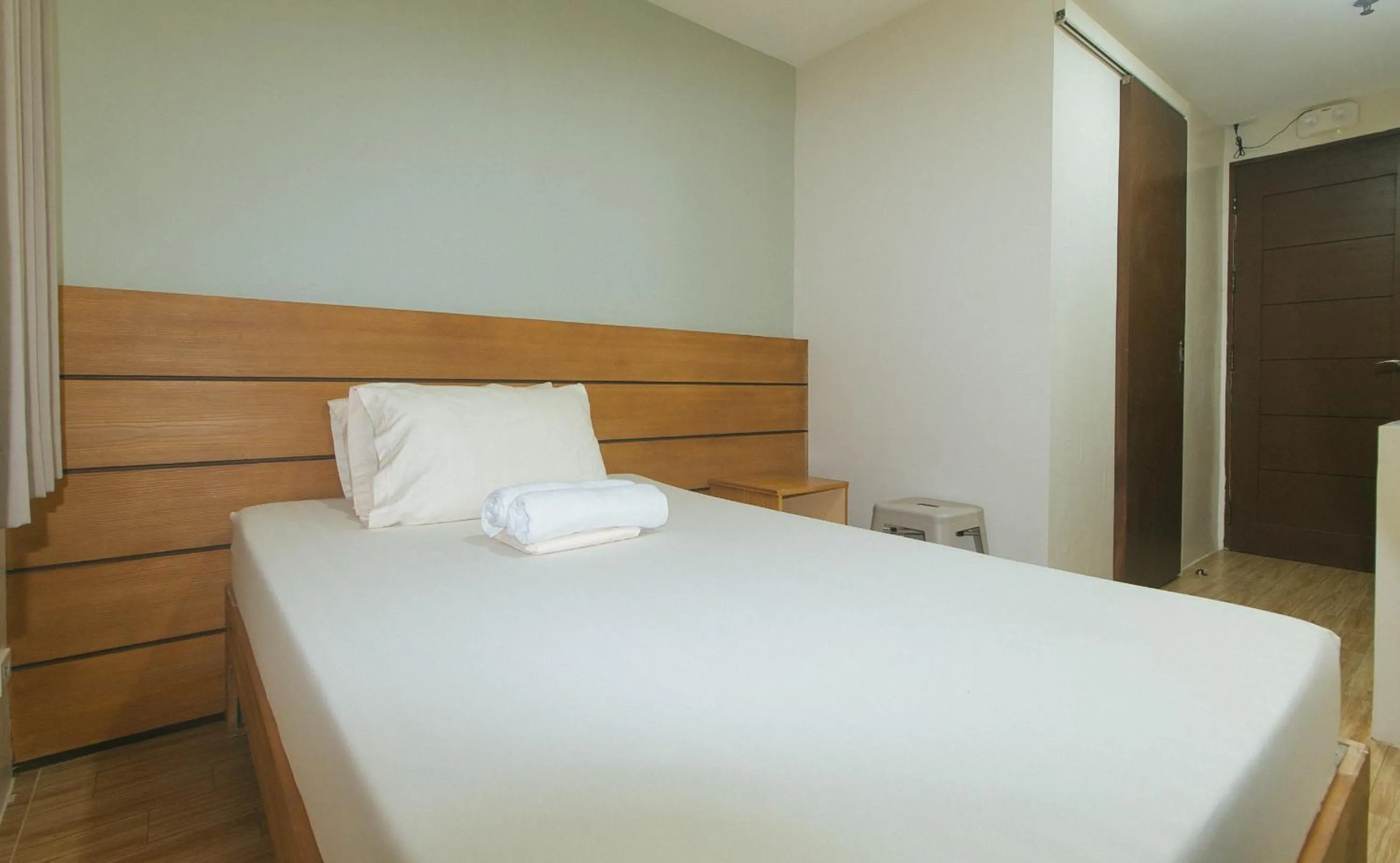 Bed in Avelida Homes by RedDoorz