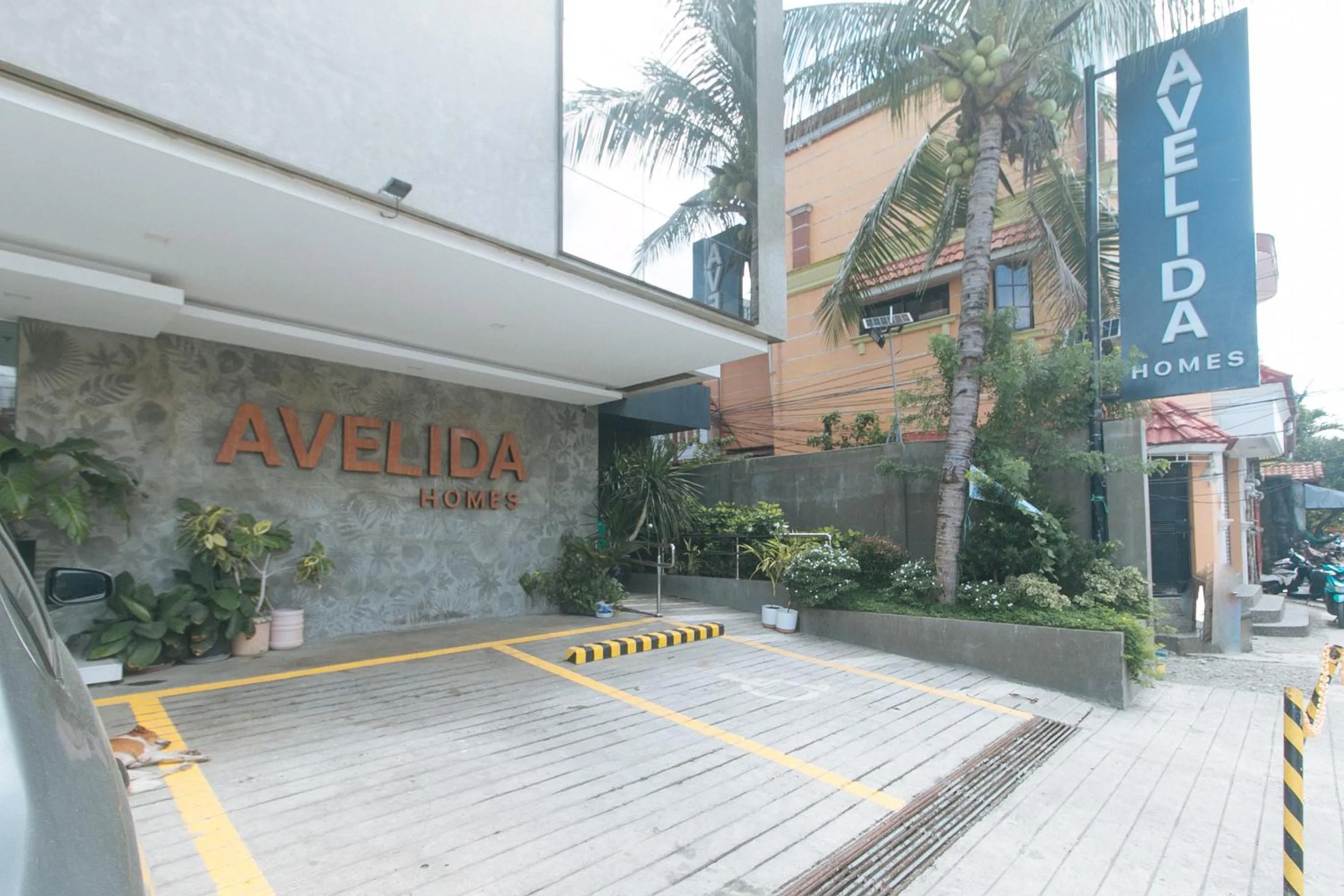 Facade/entrance in Avelida Homes by RedDoorz