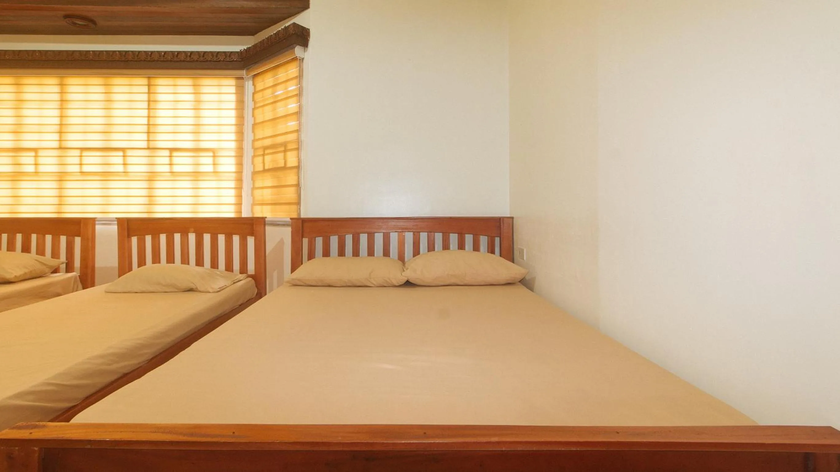 Bedroom, Bed in Kababayan Pensione House by RedDoorz