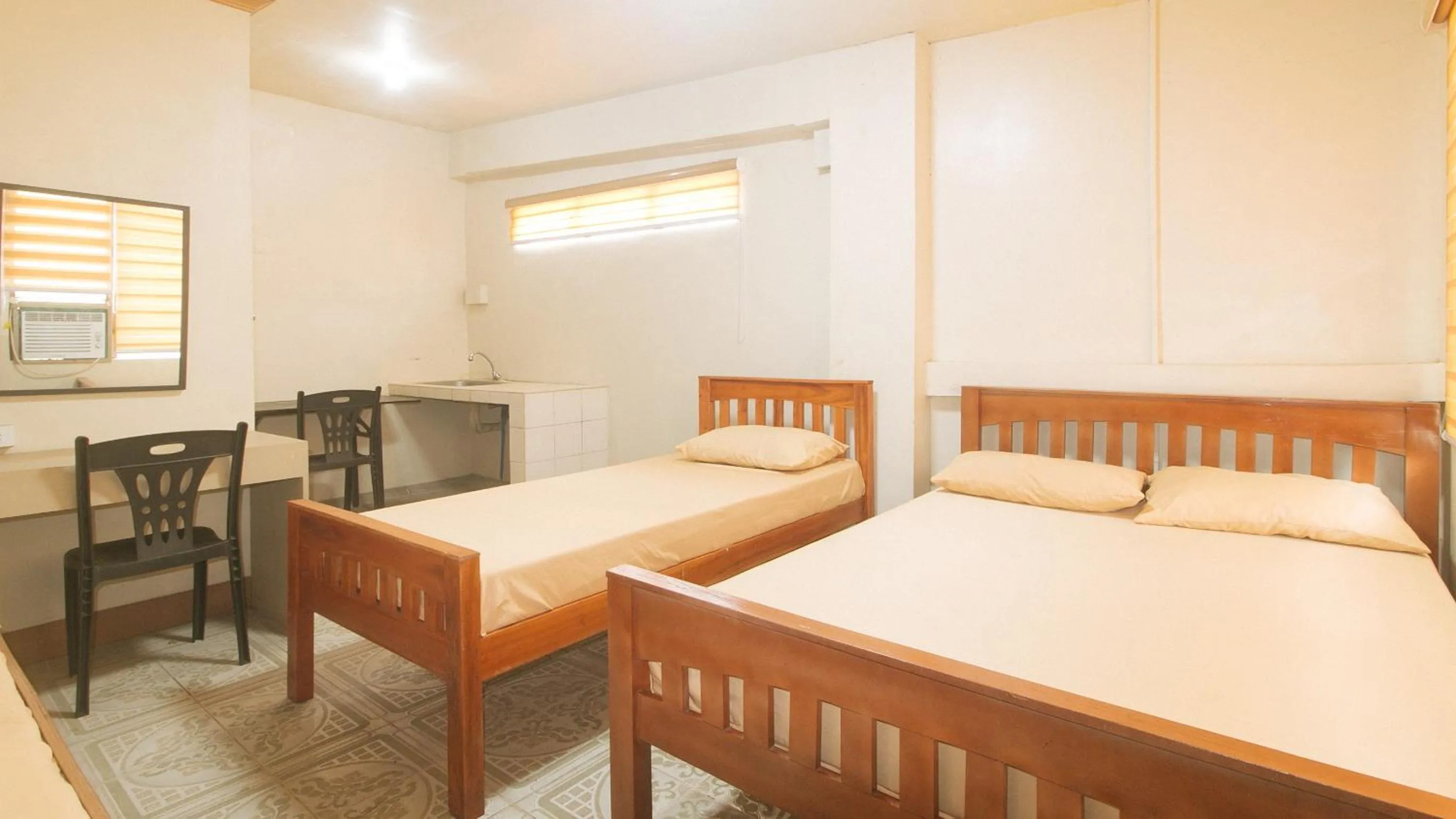 Bedroom, Bed in Kababayan Pensione House by RedDoorz