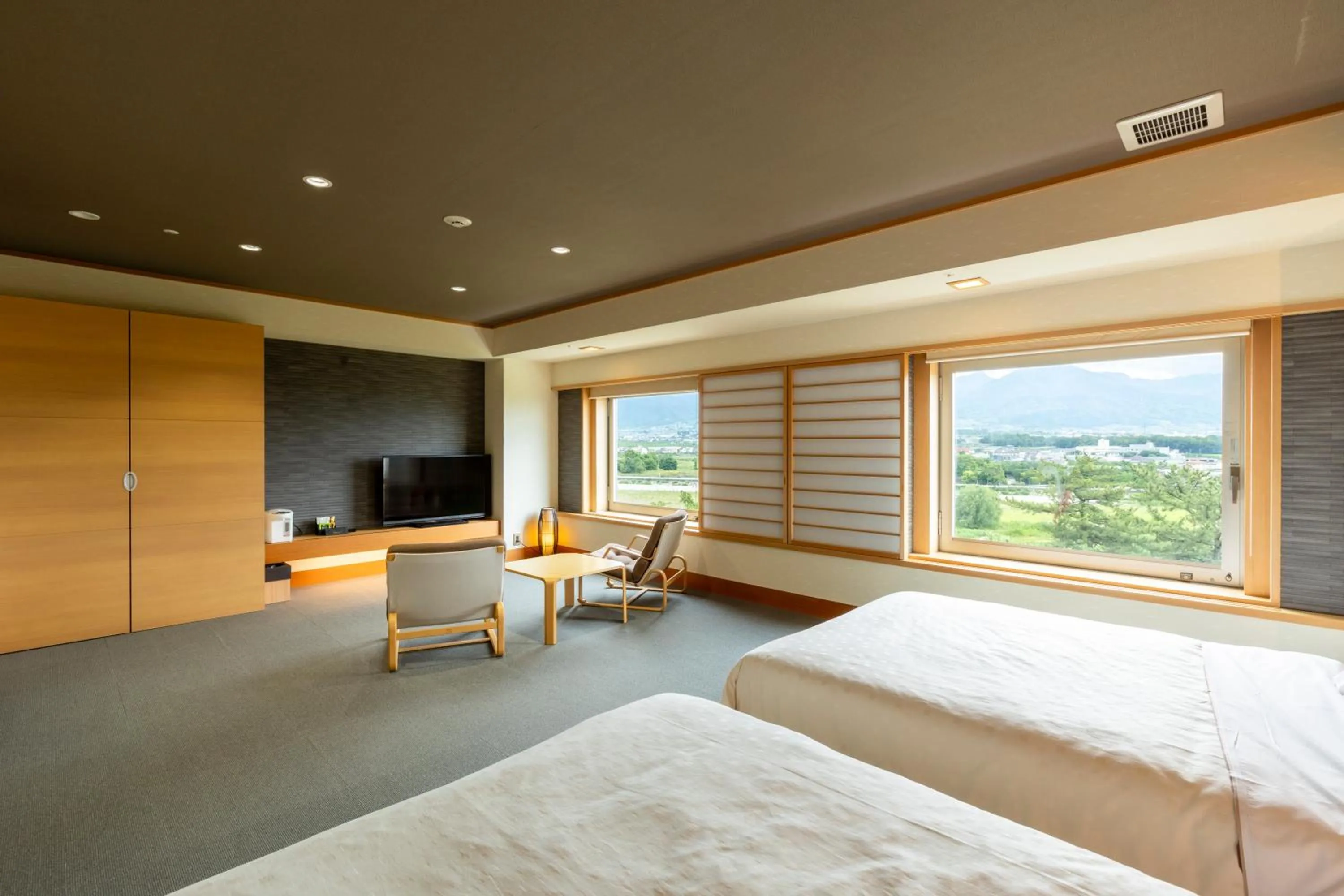 Living room, Bed in Hotel Kasugai