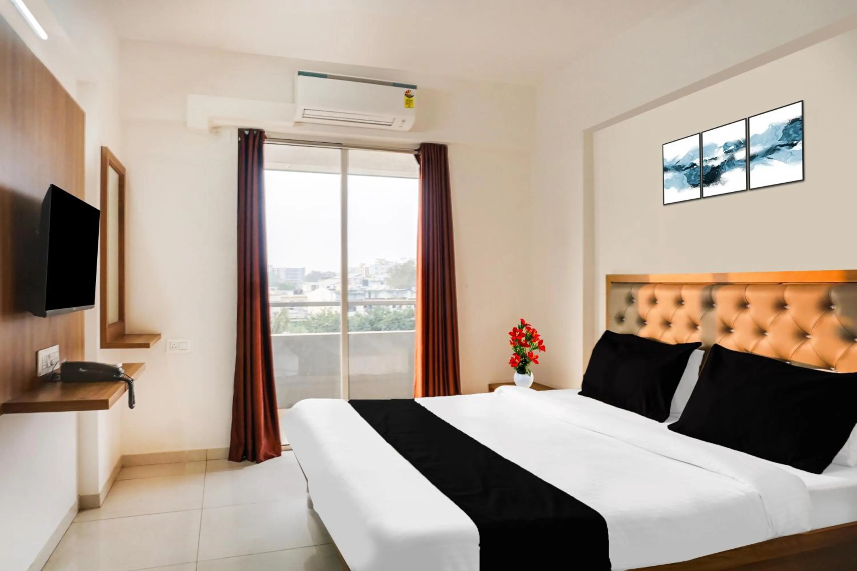 Bedroom, Bed in Super Townhouse Lohegaon Near Pune Airport formerly Landmark Regency