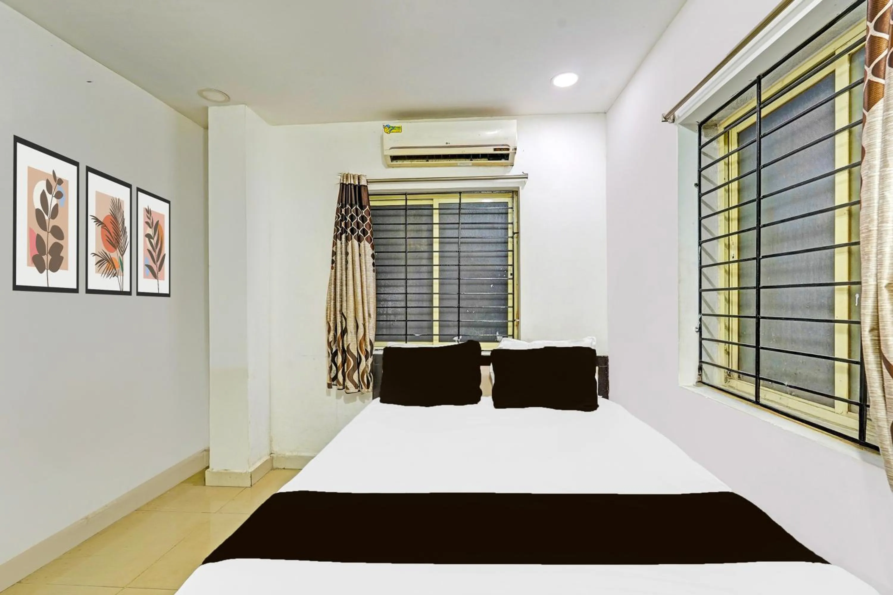 Bedroom, Bed in Collection O Vanamthopu Center Nellore Formerly ESR Guest Inn