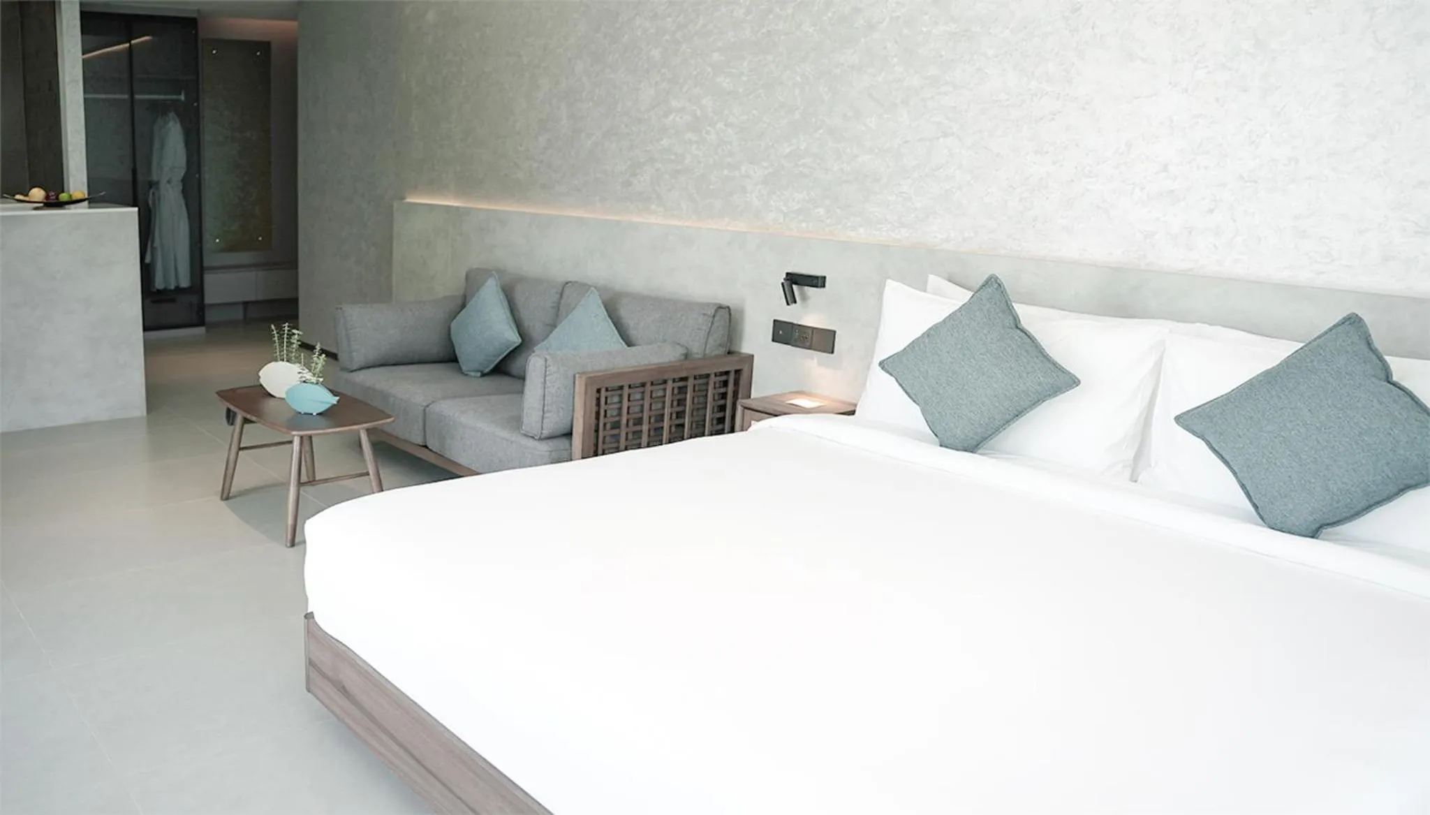 Seating area, Bed in Kora Beach Resort Phuket