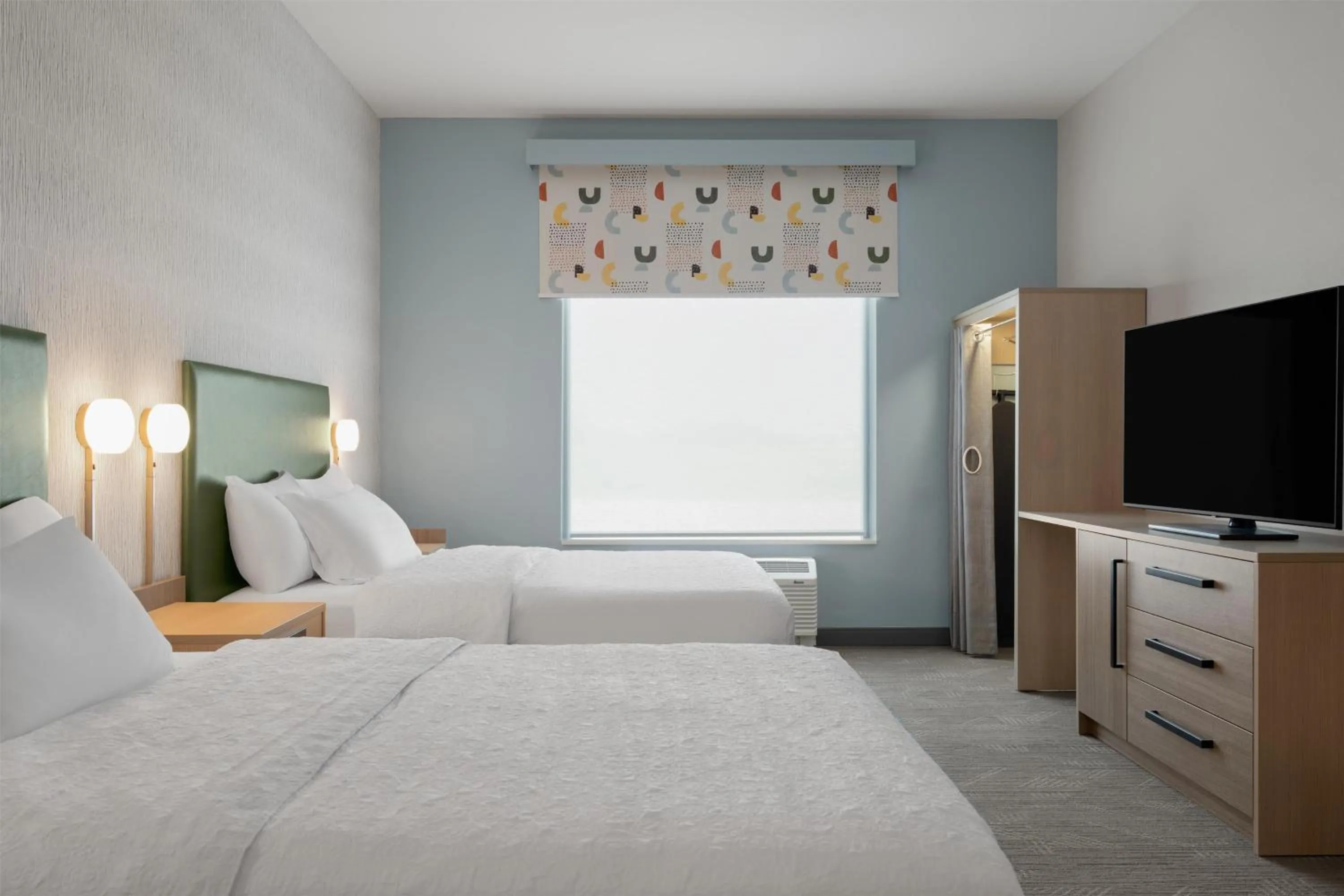 Bed in Home2 Suites By Hilton Kearney