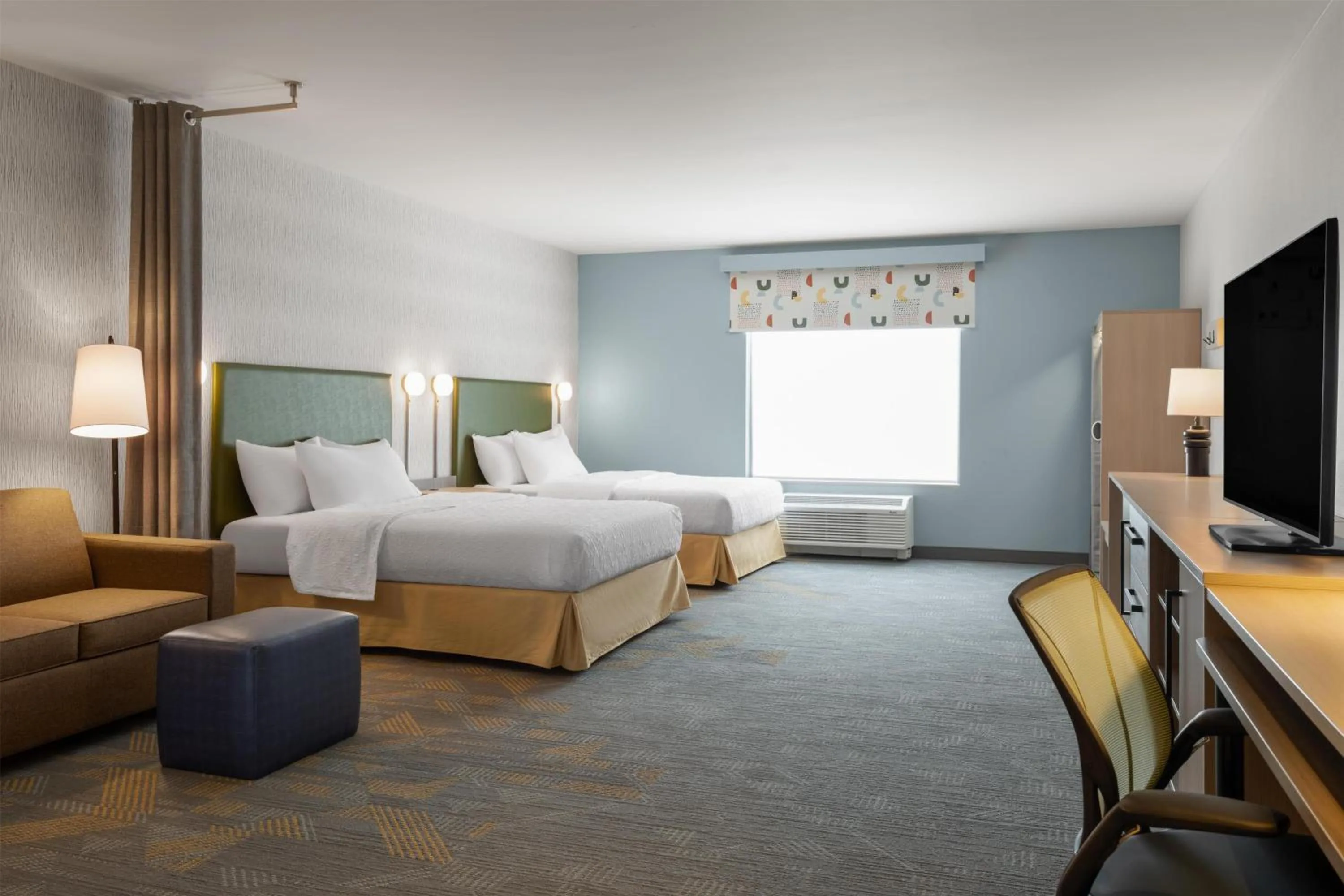 Bed in Home2 Suites By Hilton Kearney