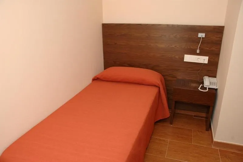 Photo of the whole room, Bed in Hostal Los Coronales