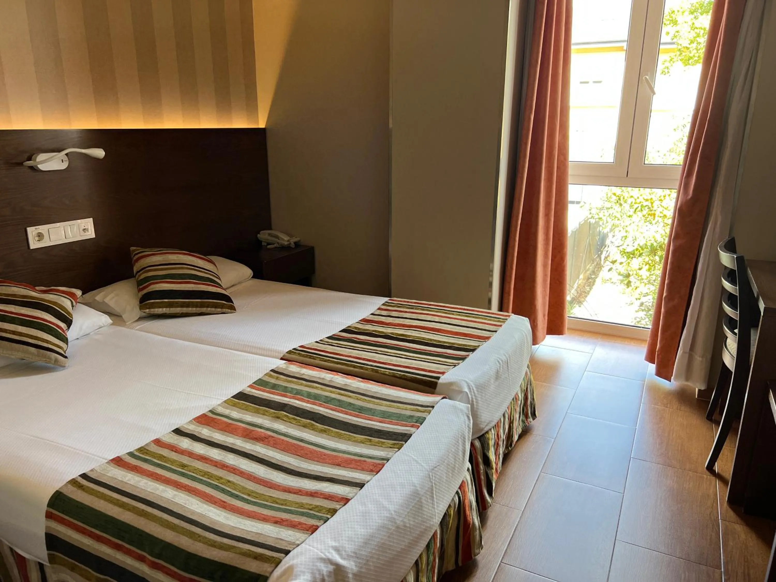 Bed in Hostal Los Coronales