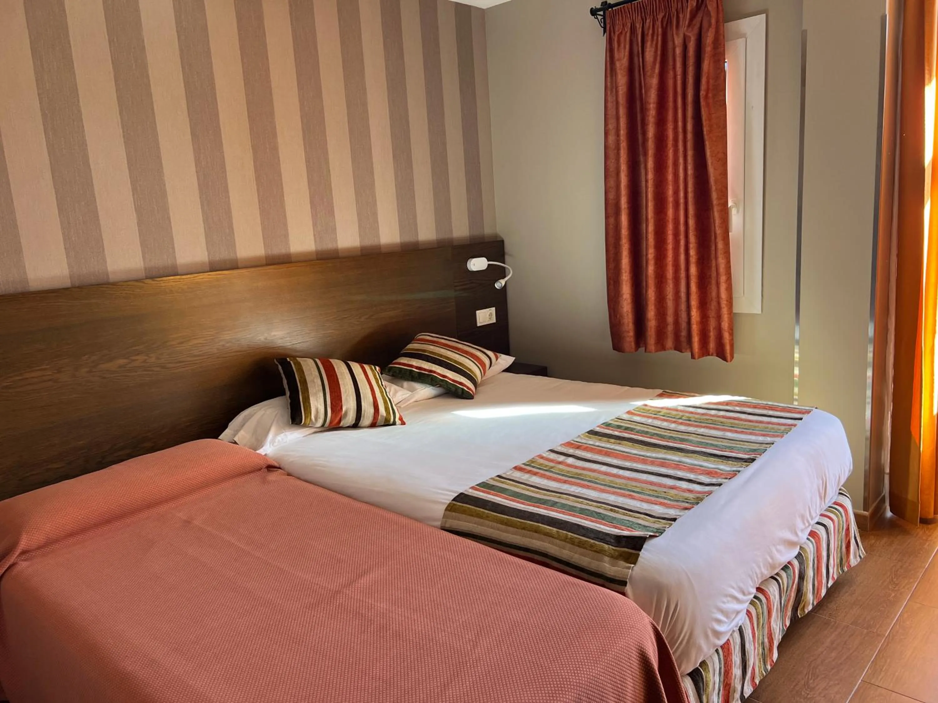 Bed in Hostal Los Coronales