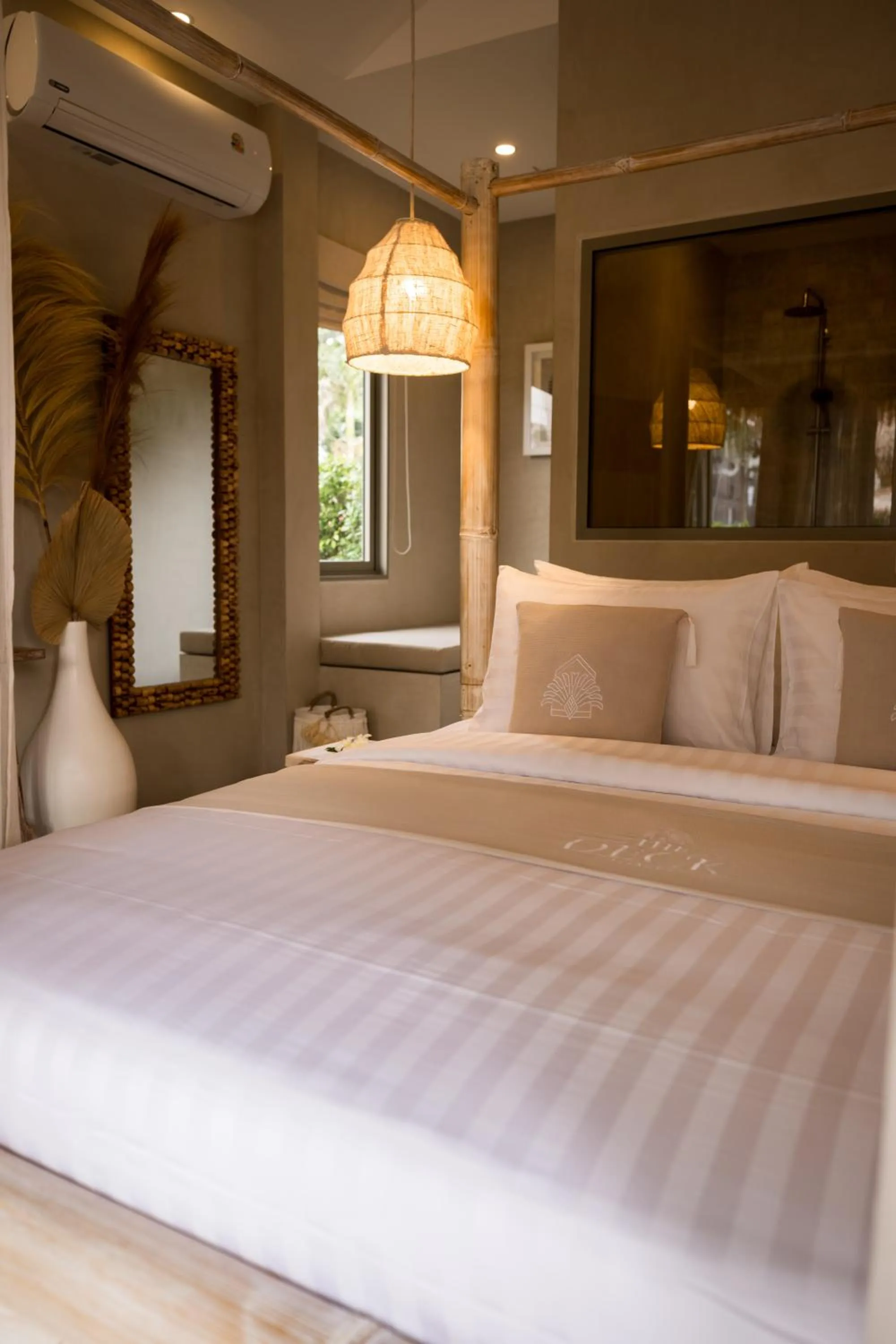 Bed in The Deck Cottages Samui