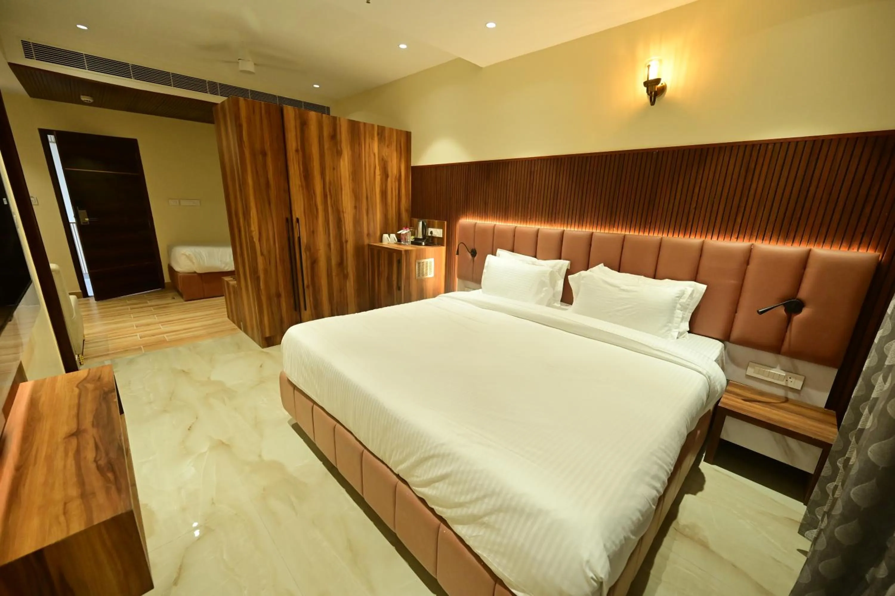 Photo of the whole room, Bed in Hotel Vishwam Residency