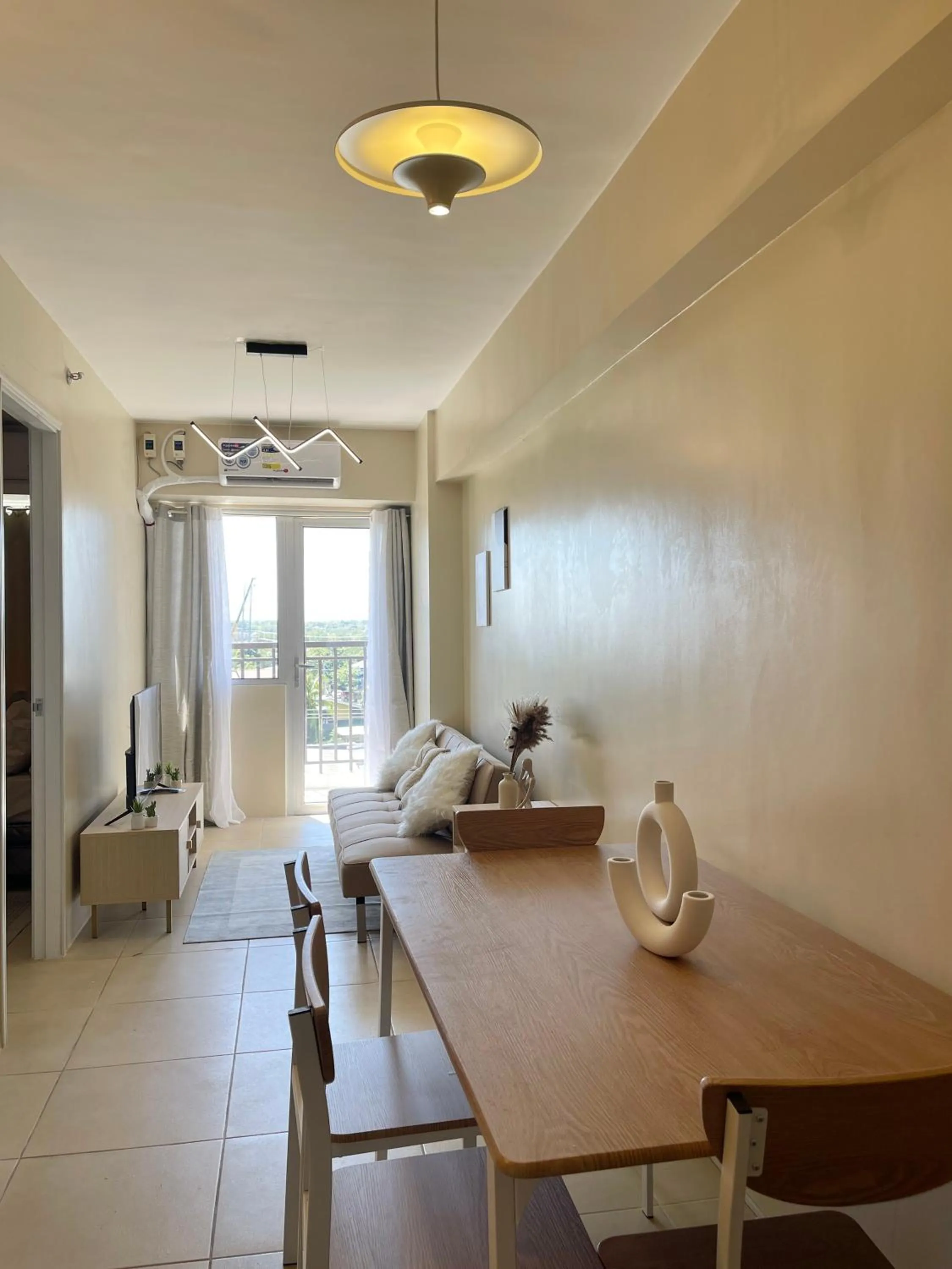 Living room, Bed in Avida Towers Atria