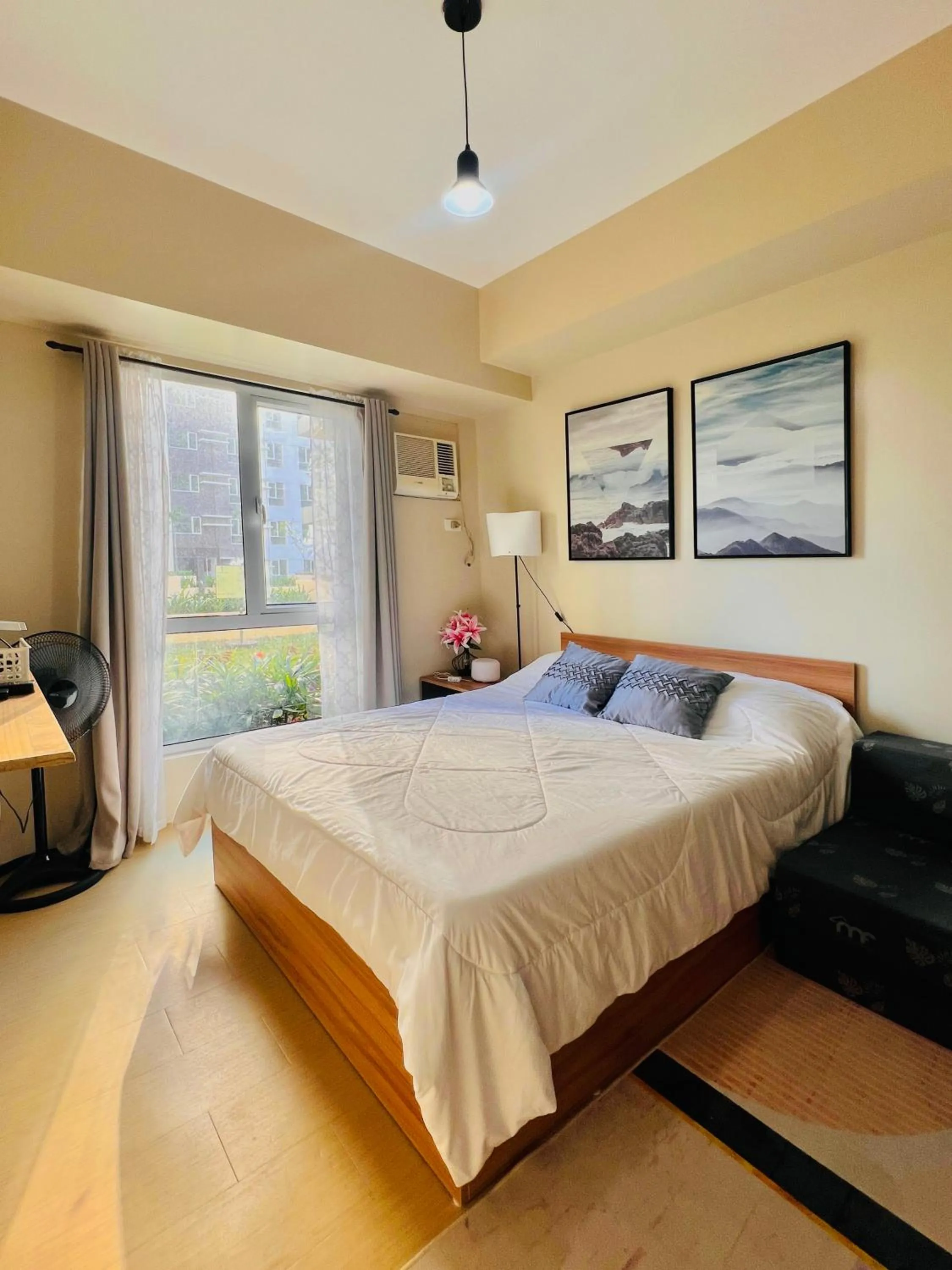 Photo of the whole room, Bed in Avida Towers Atria