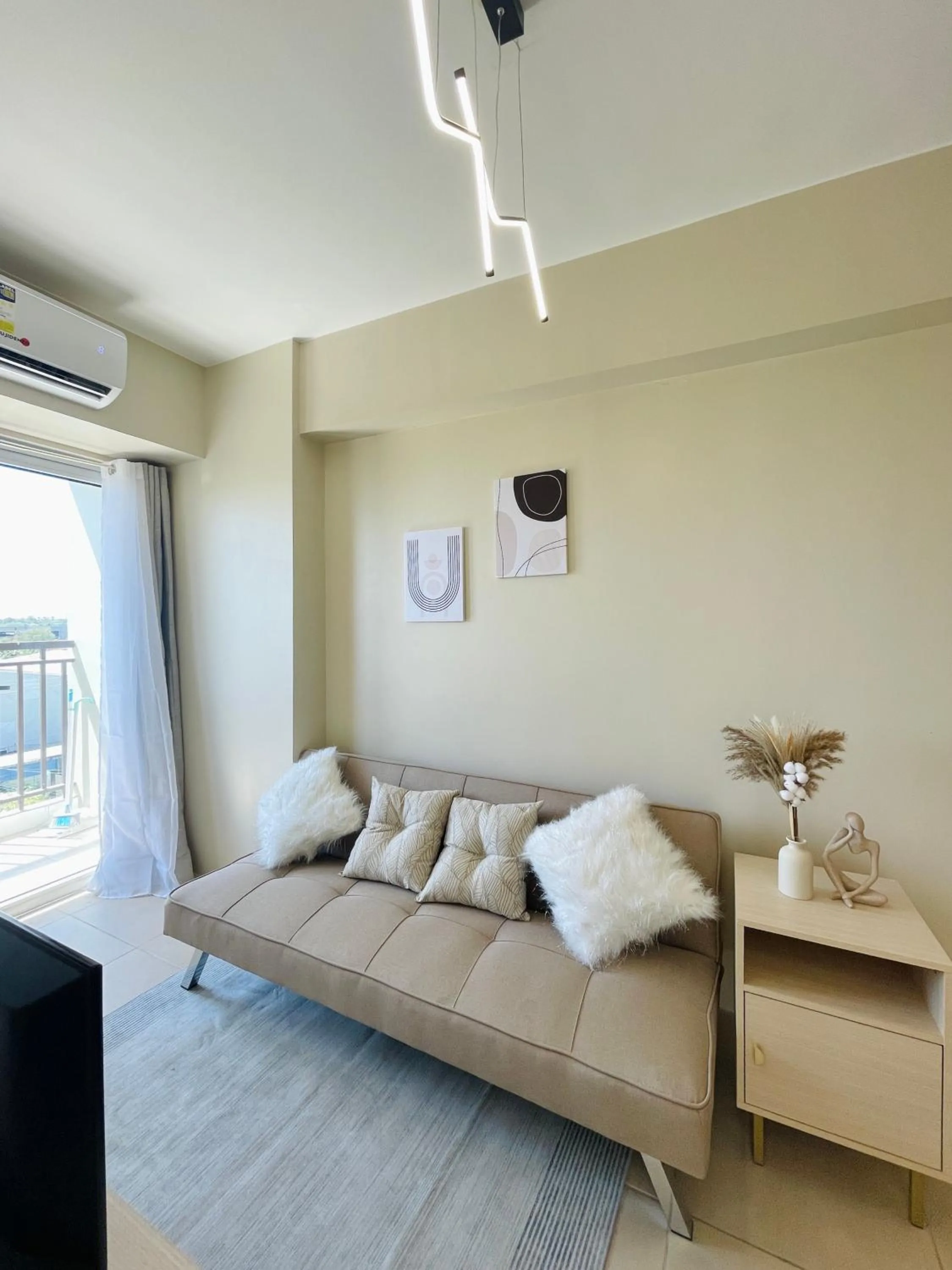 Living room, Bed in Avida Towers Atria