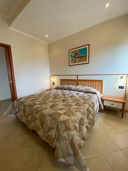 Bed in Hotel Residence Due Mari