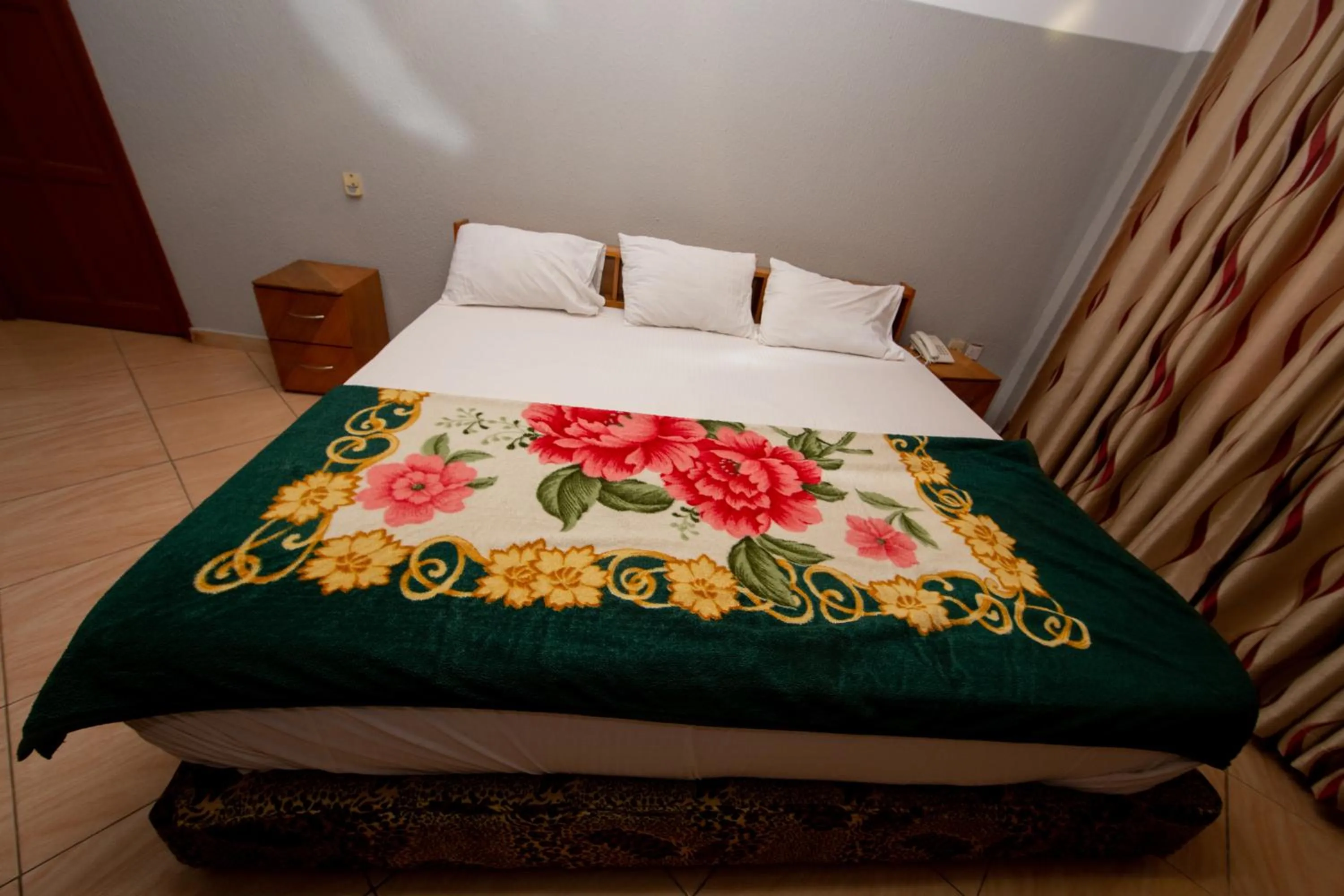 Bed in Pemicsa Hotel Accra