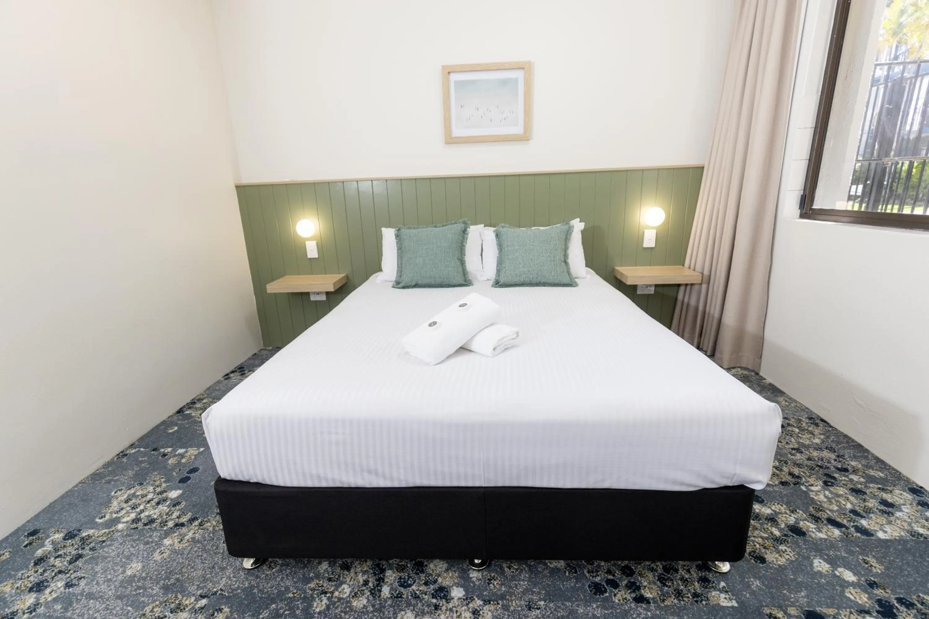 Bed in Currimundi Hotel