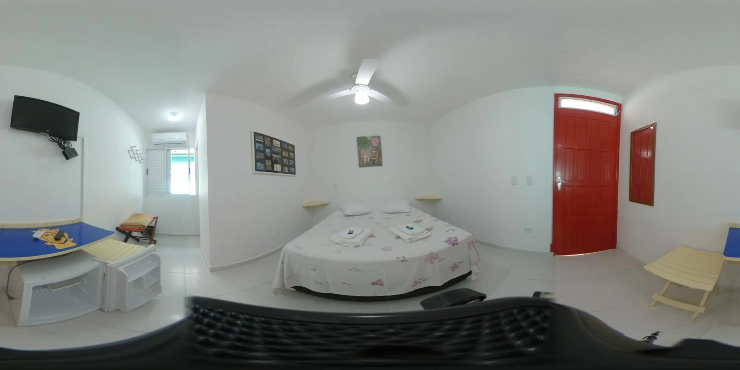 Photo of the whole room, Bed in Urbano Suítes