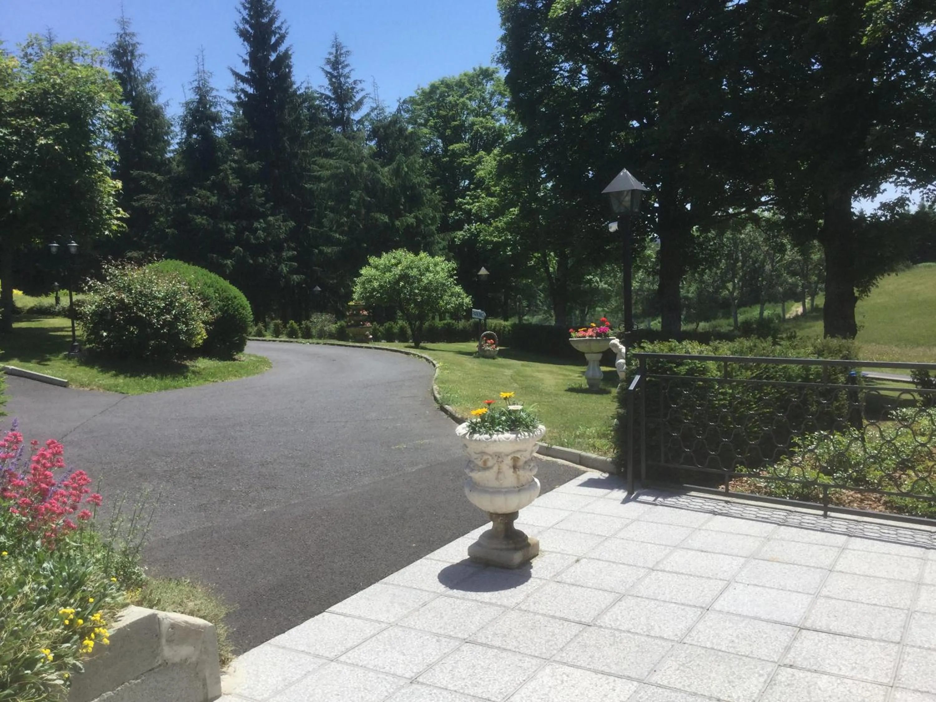 Garden in Logis Hôtel Le Relais du Bois Vialotte