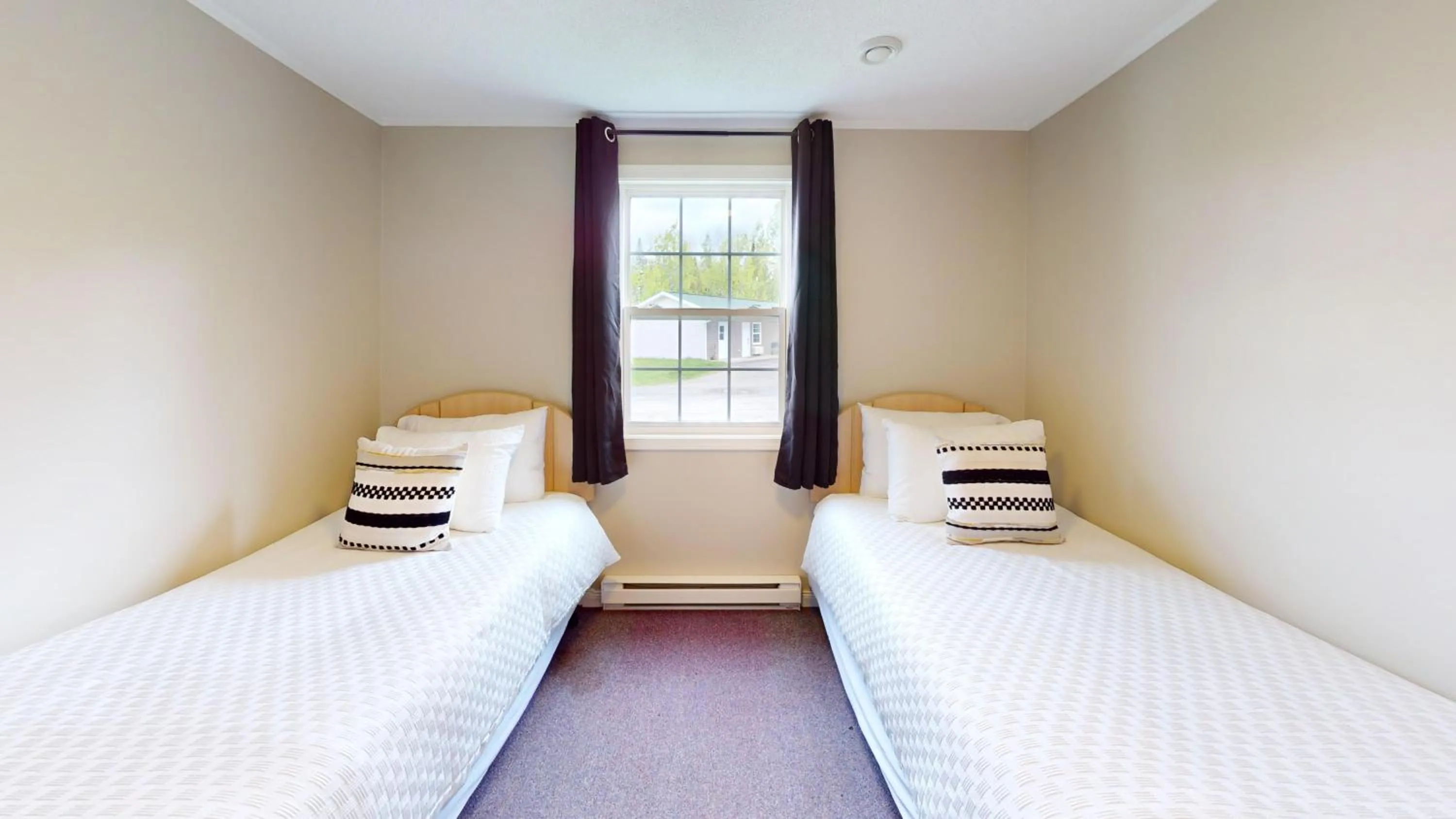 Bed in Lakeside Stays