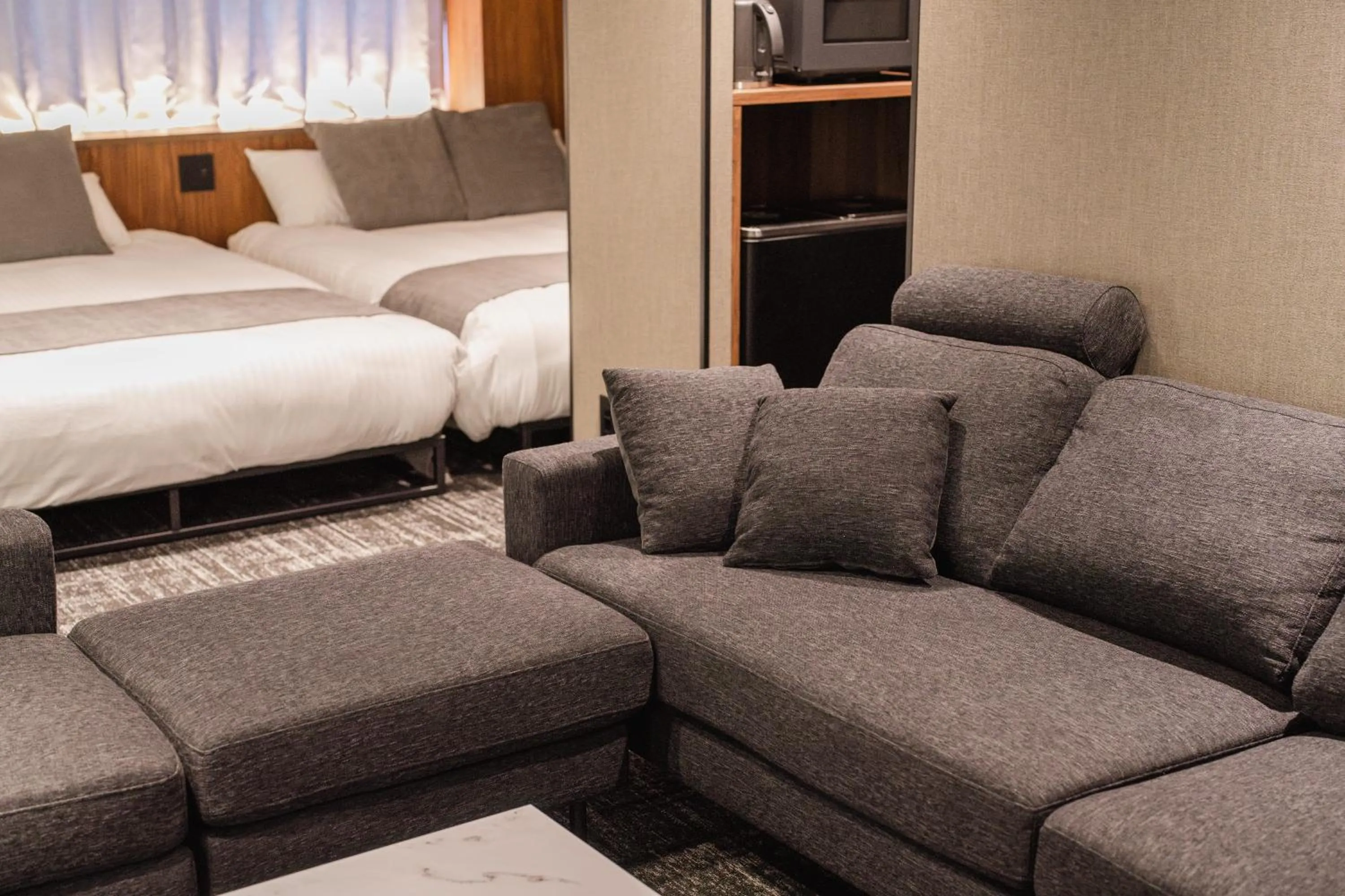 Living room, Bed in The LOFT INN HAKATA