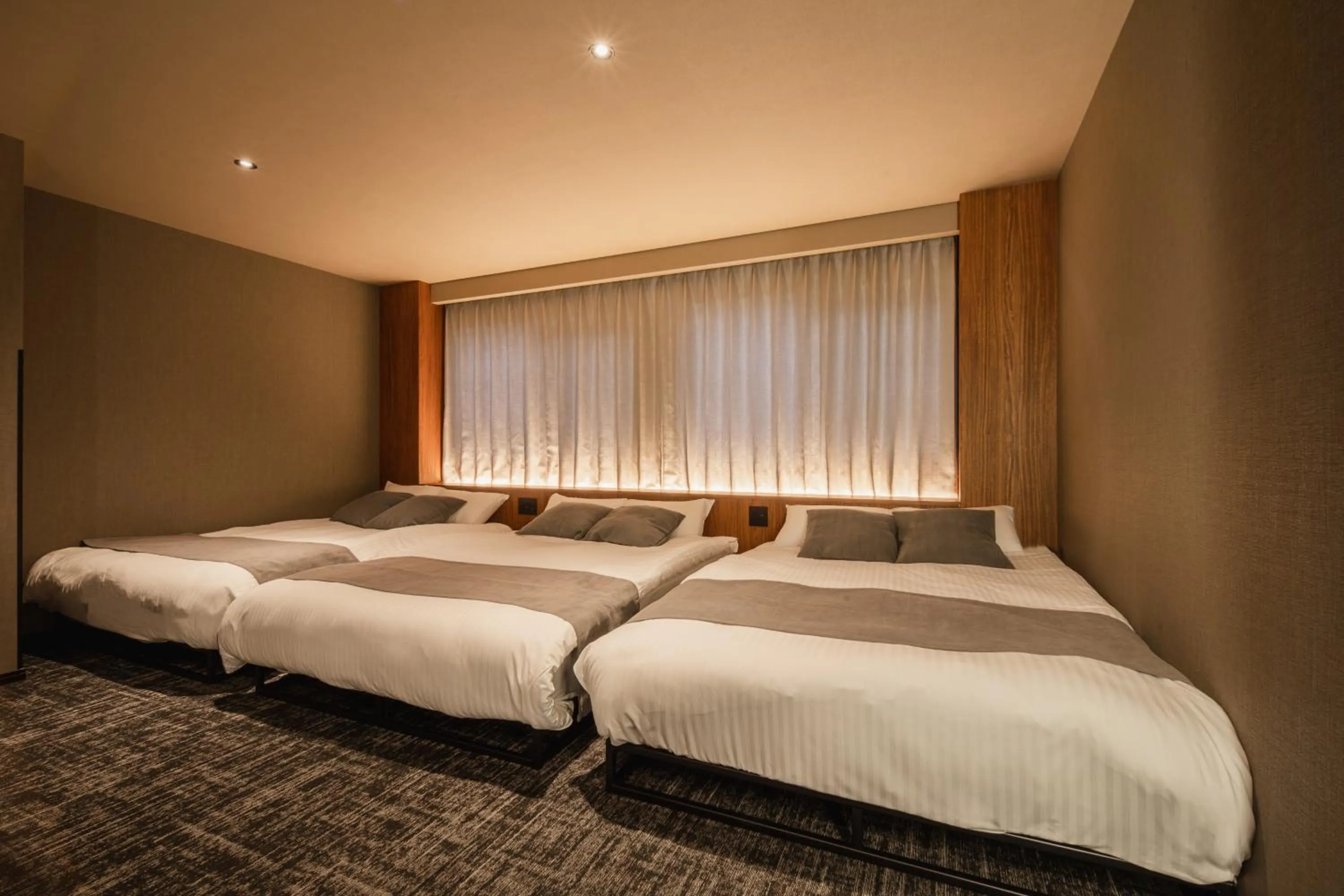 Bed in The LOFT INN HAKATA