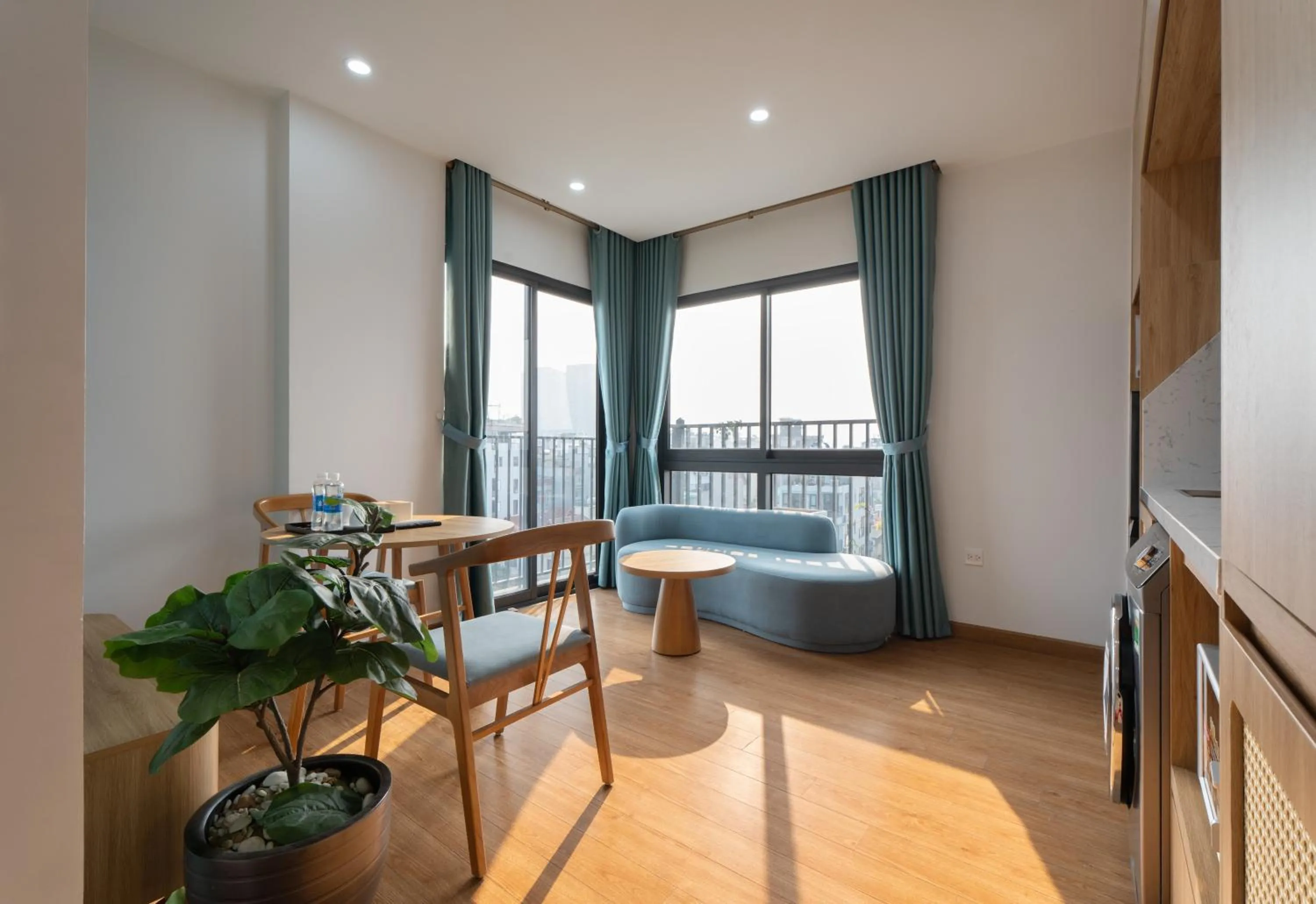 Seating area, Bed in MOONLIT Suites Hotel by Luxe Paradise