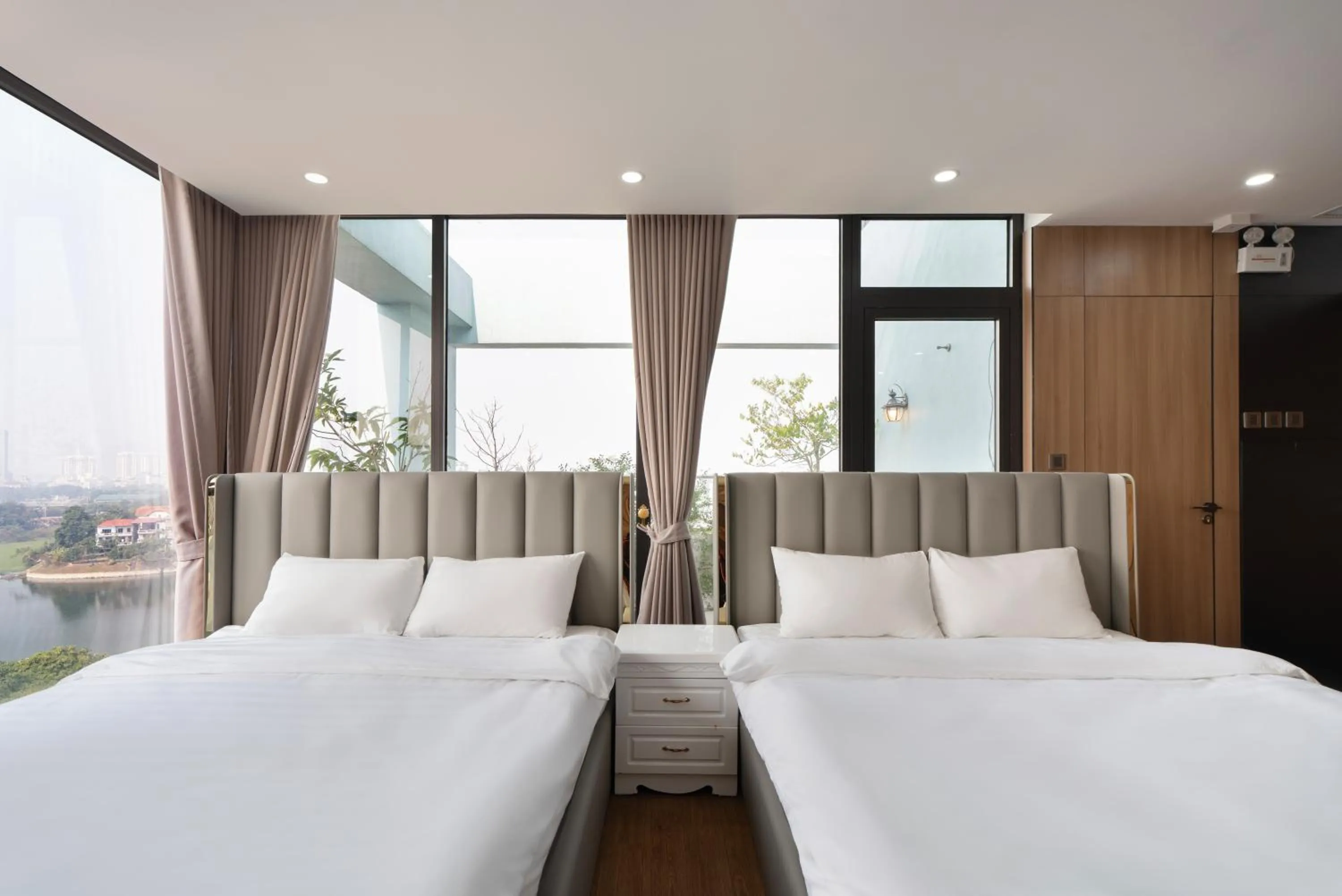 Bed in MOONLIT Suites Hotel by Luxe Paradise
