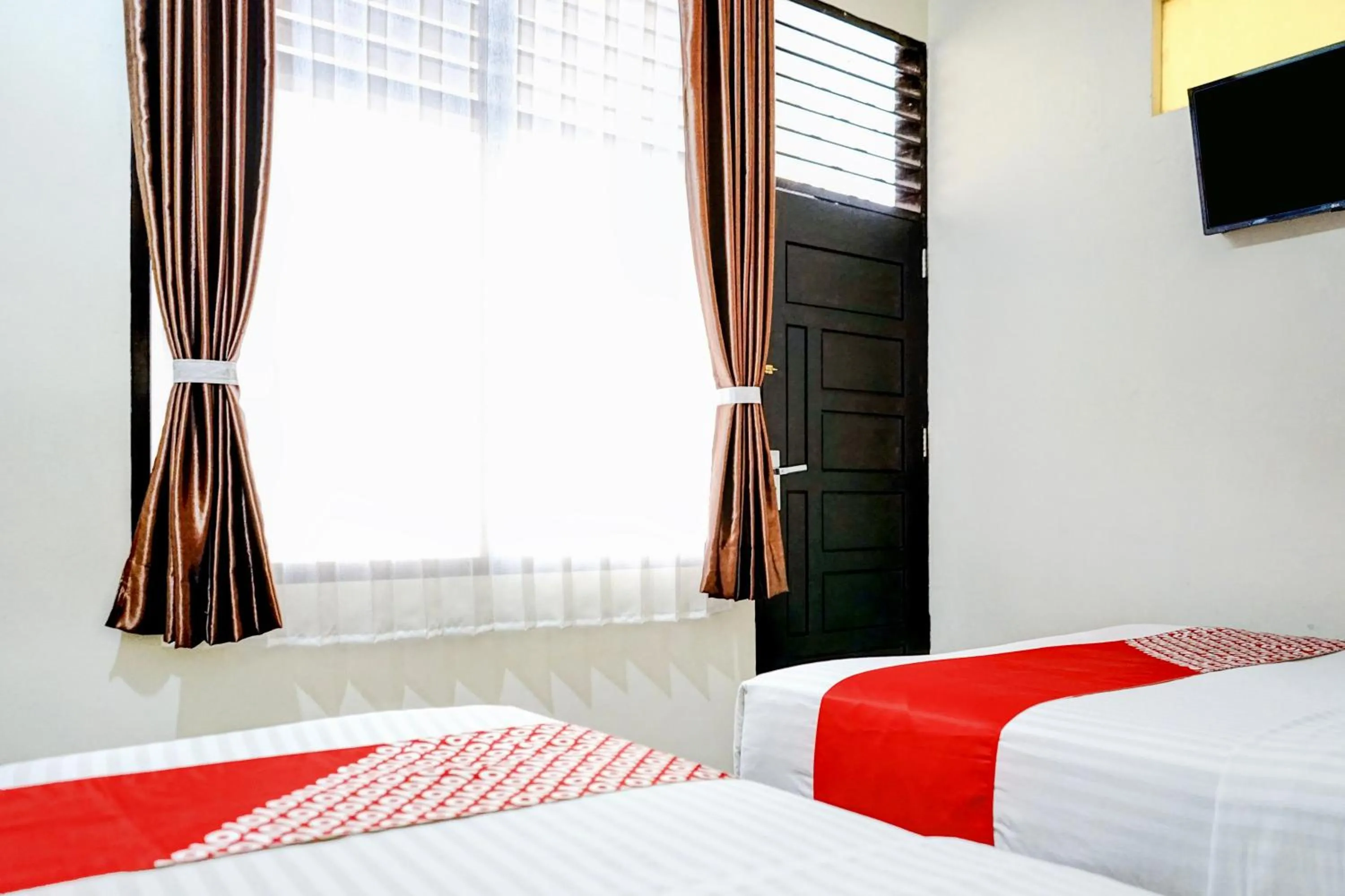 Bedroom, Bed in Hotel O Mantari Guesthouse