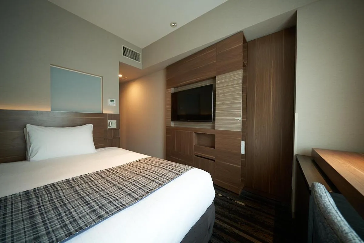 Bed in Hotel Sunroute Ginza