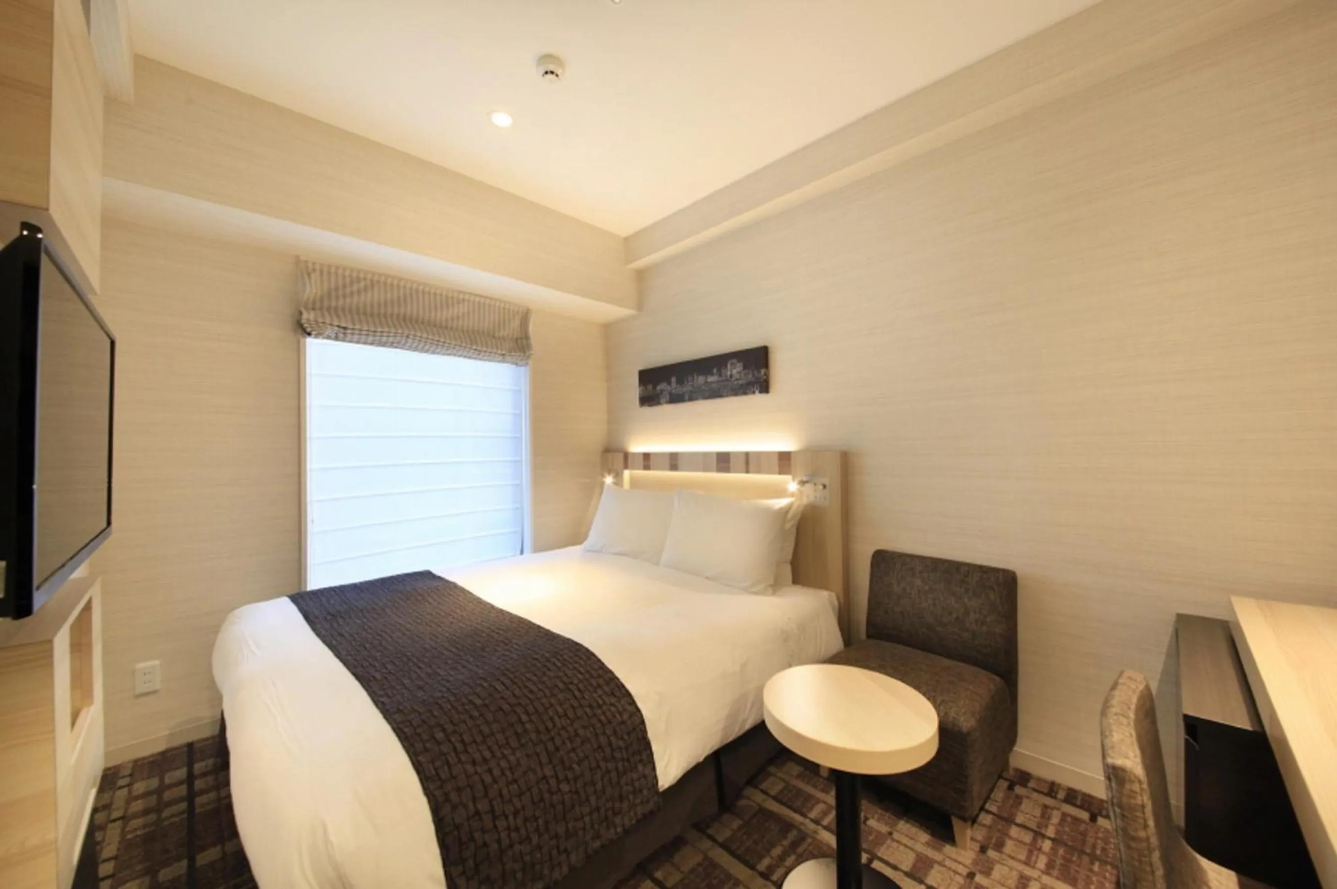 Photo of the whole room, Bed in Hotel Sunroute Ginza