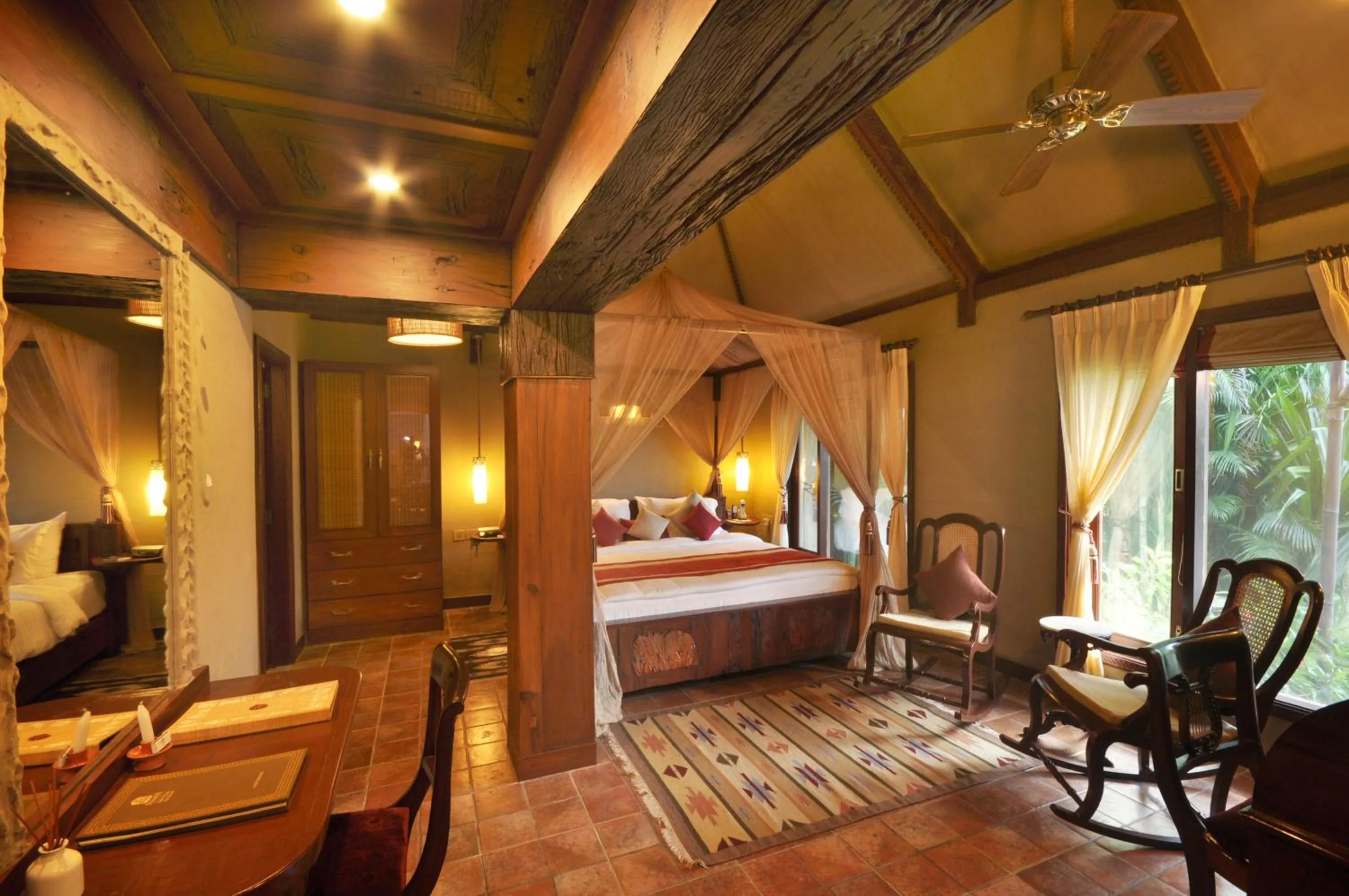 Seating area, Bed in Vedic Village Spa Resort Kolkata