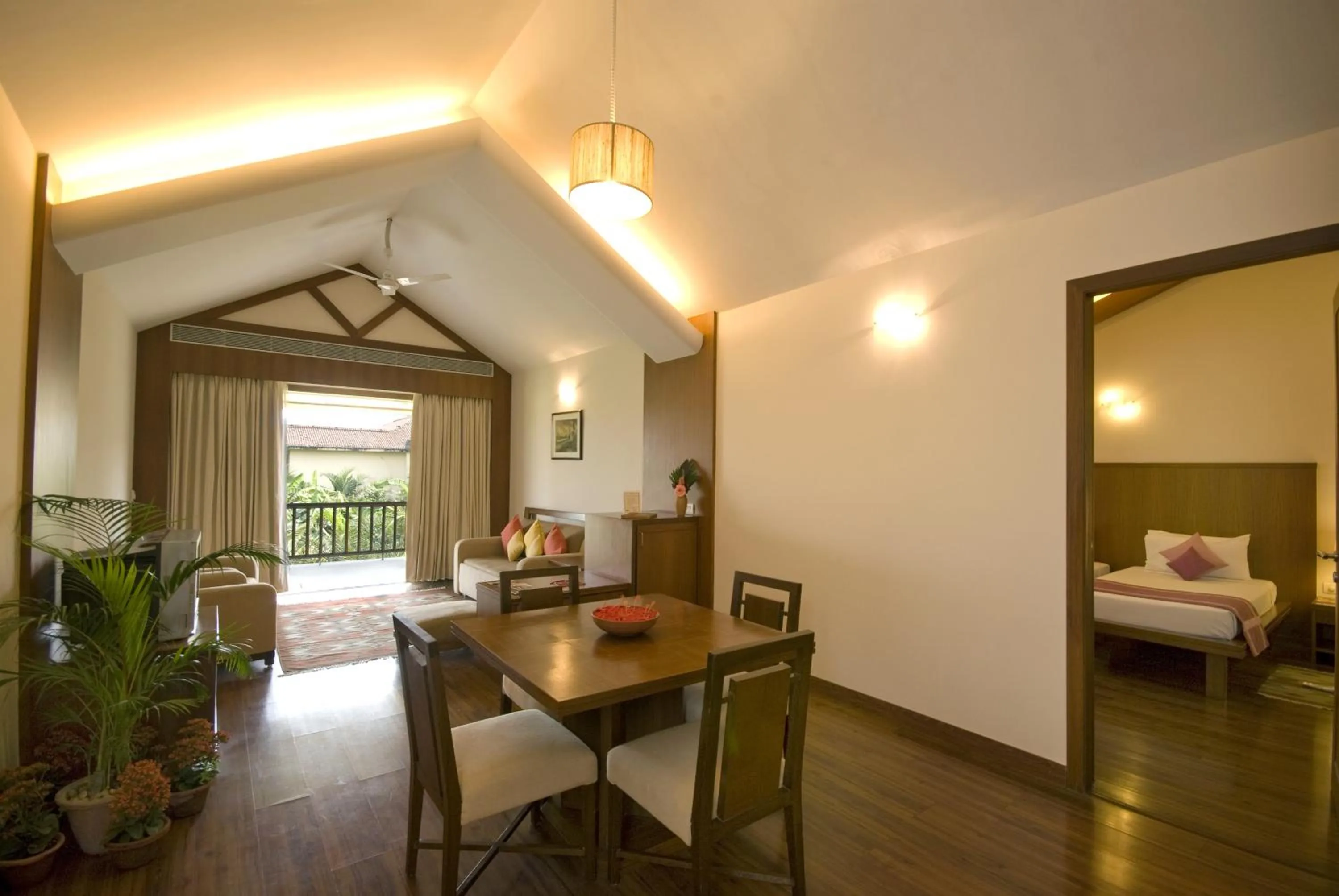 Dining area, Bed in Vedic Village Spa Resort Kolkata