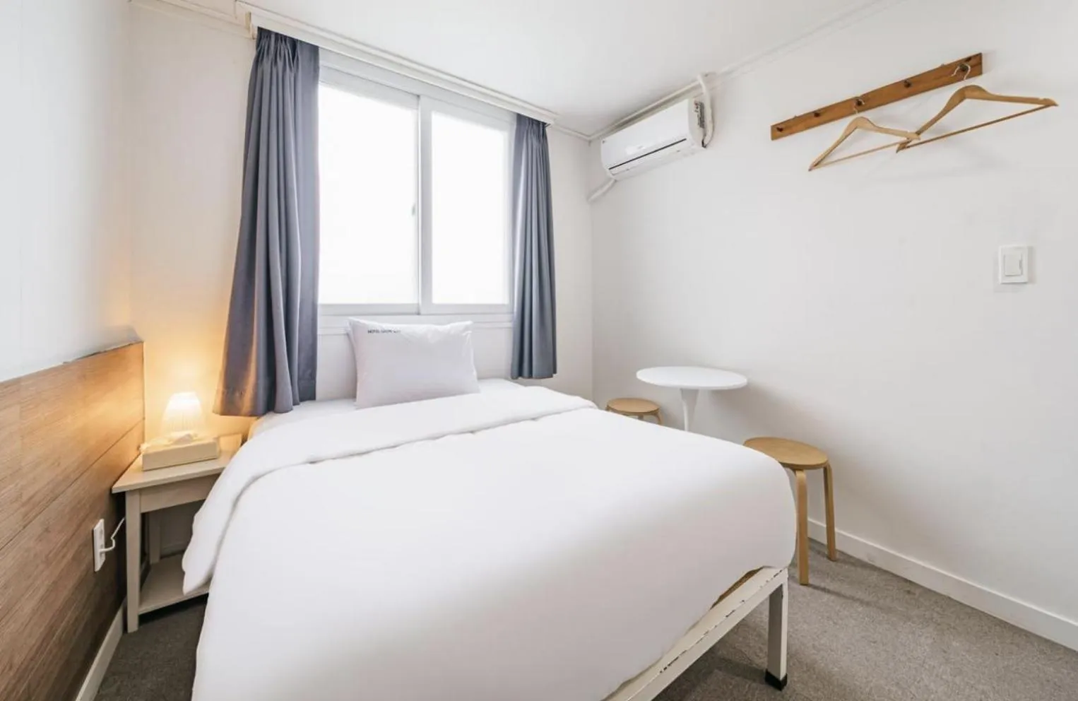 Bed in Gaon J Stay Hotel