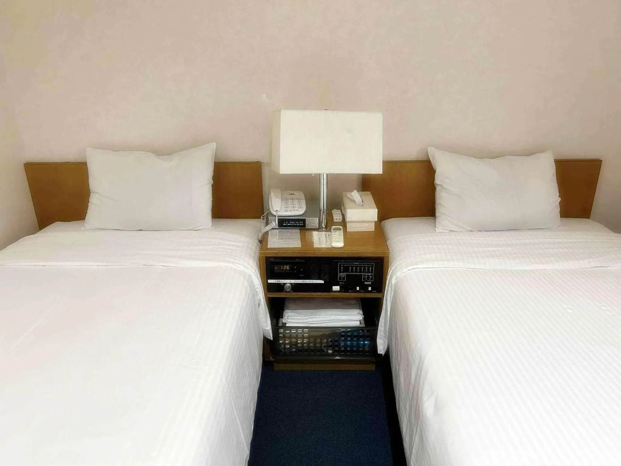 Bed in Sankei City Hotel Hachioji