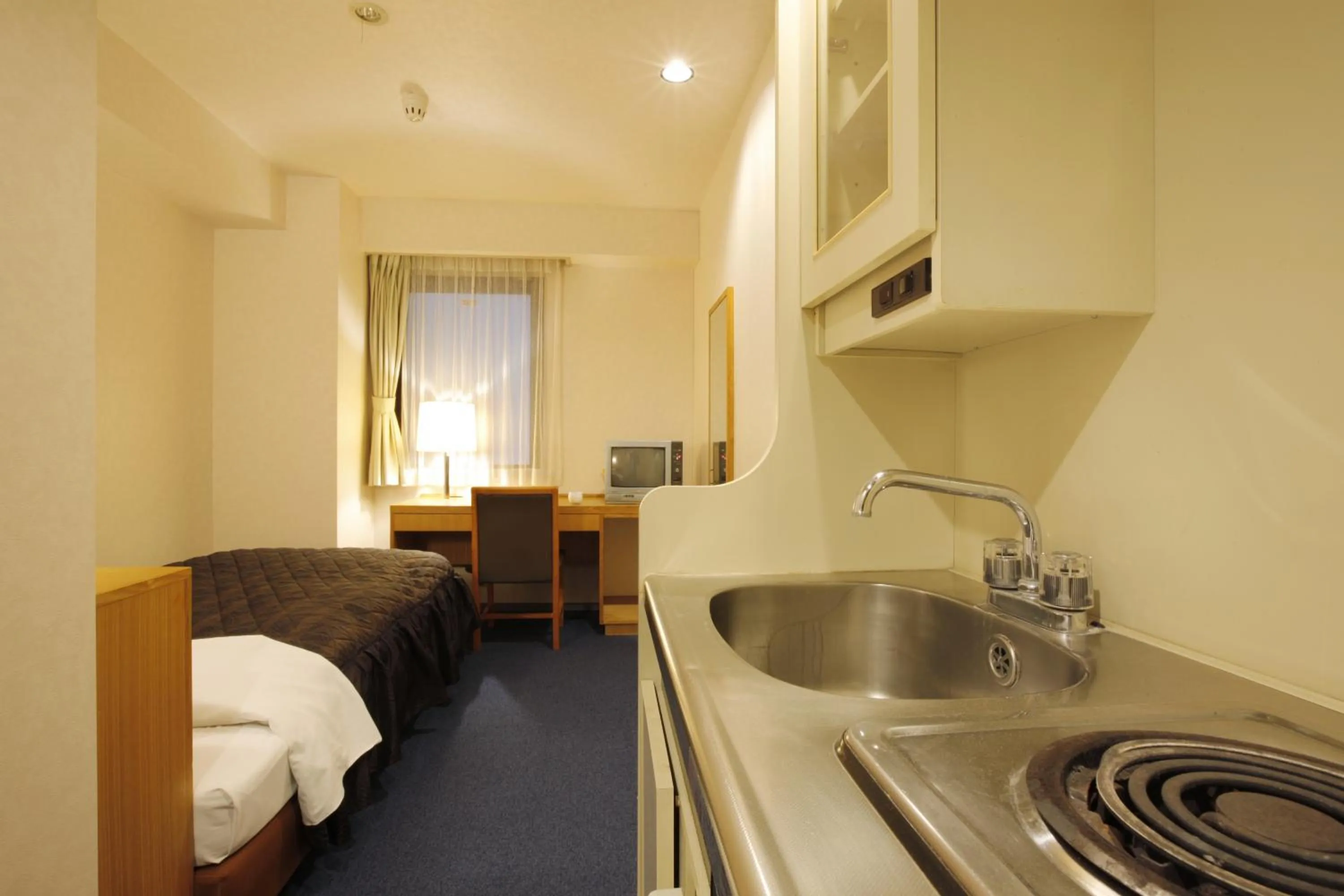 Kitchen or kitchenette in Sankei City Hotel Hachioji