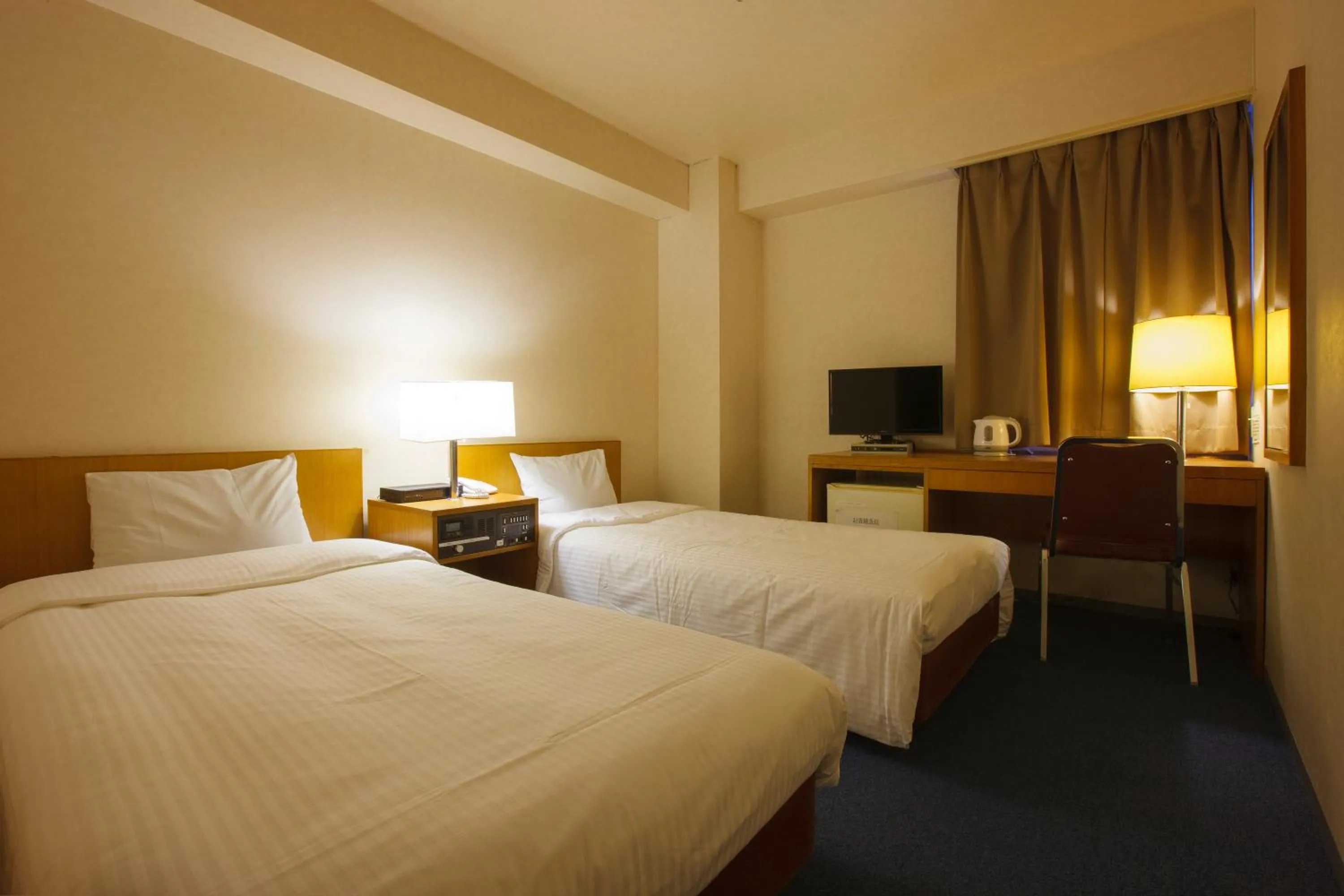 Bed in Sankei City Hotel Hachioji