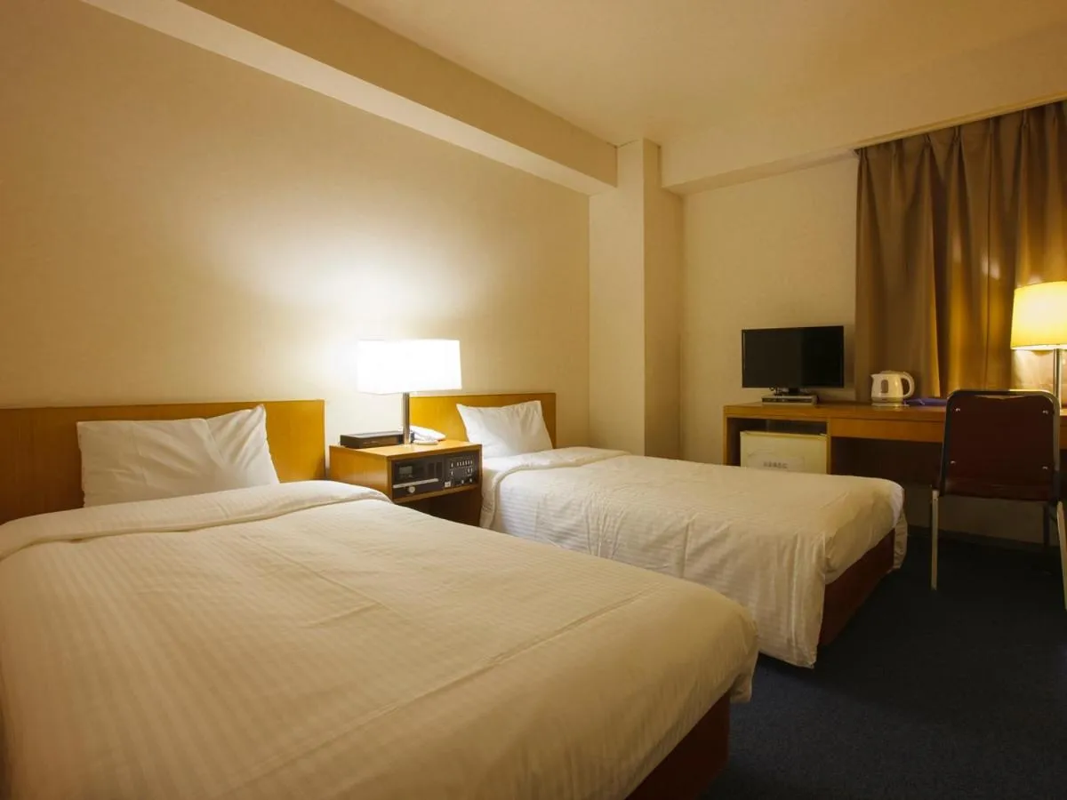 Bed in Sankei City Hotel Hachioji