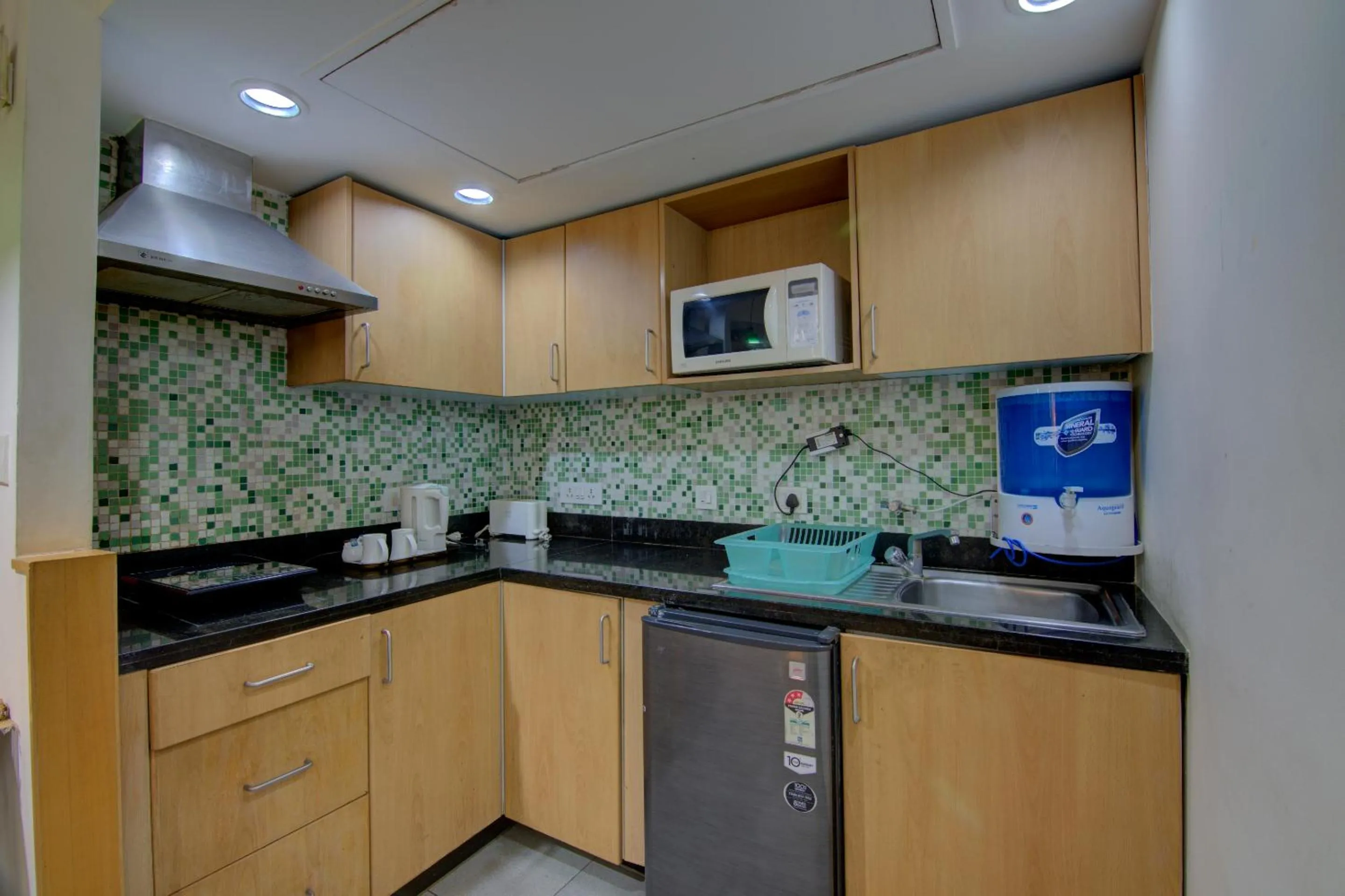 Kitchen or kitchenette in Tristar Serviced Apartments