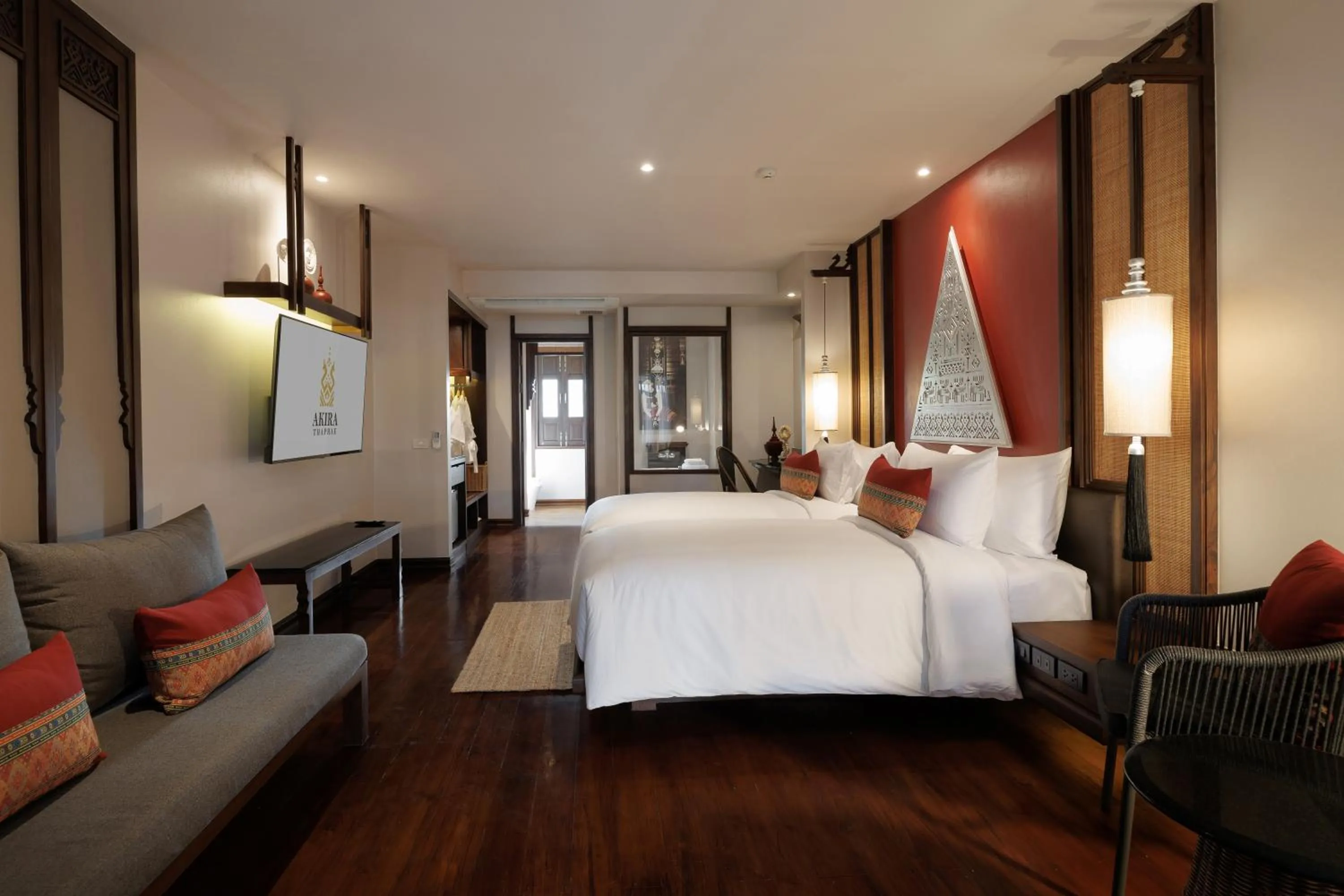 Bed in Akira Thaphae Hotel