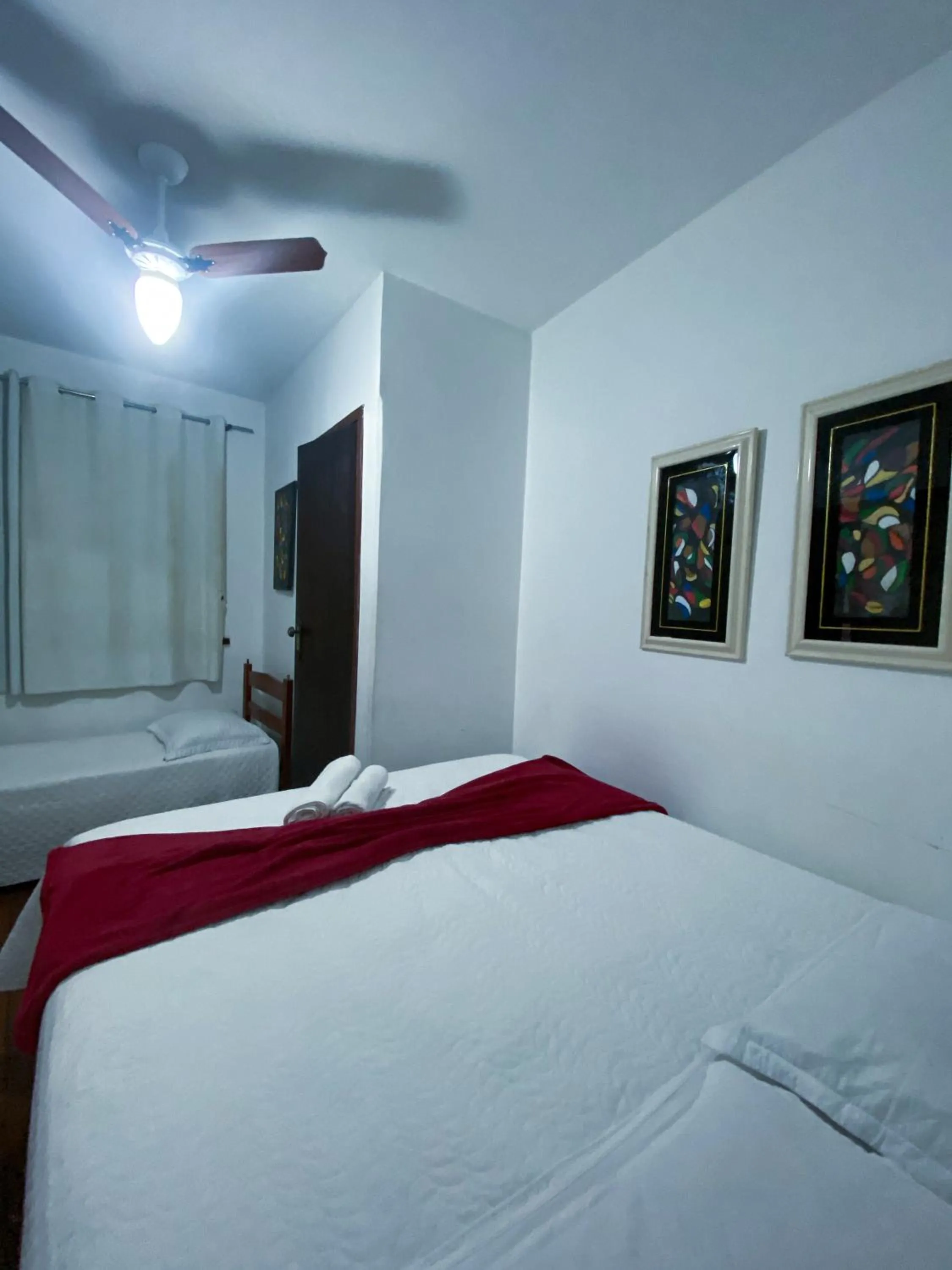 Bed in Pousada Flor de Lis