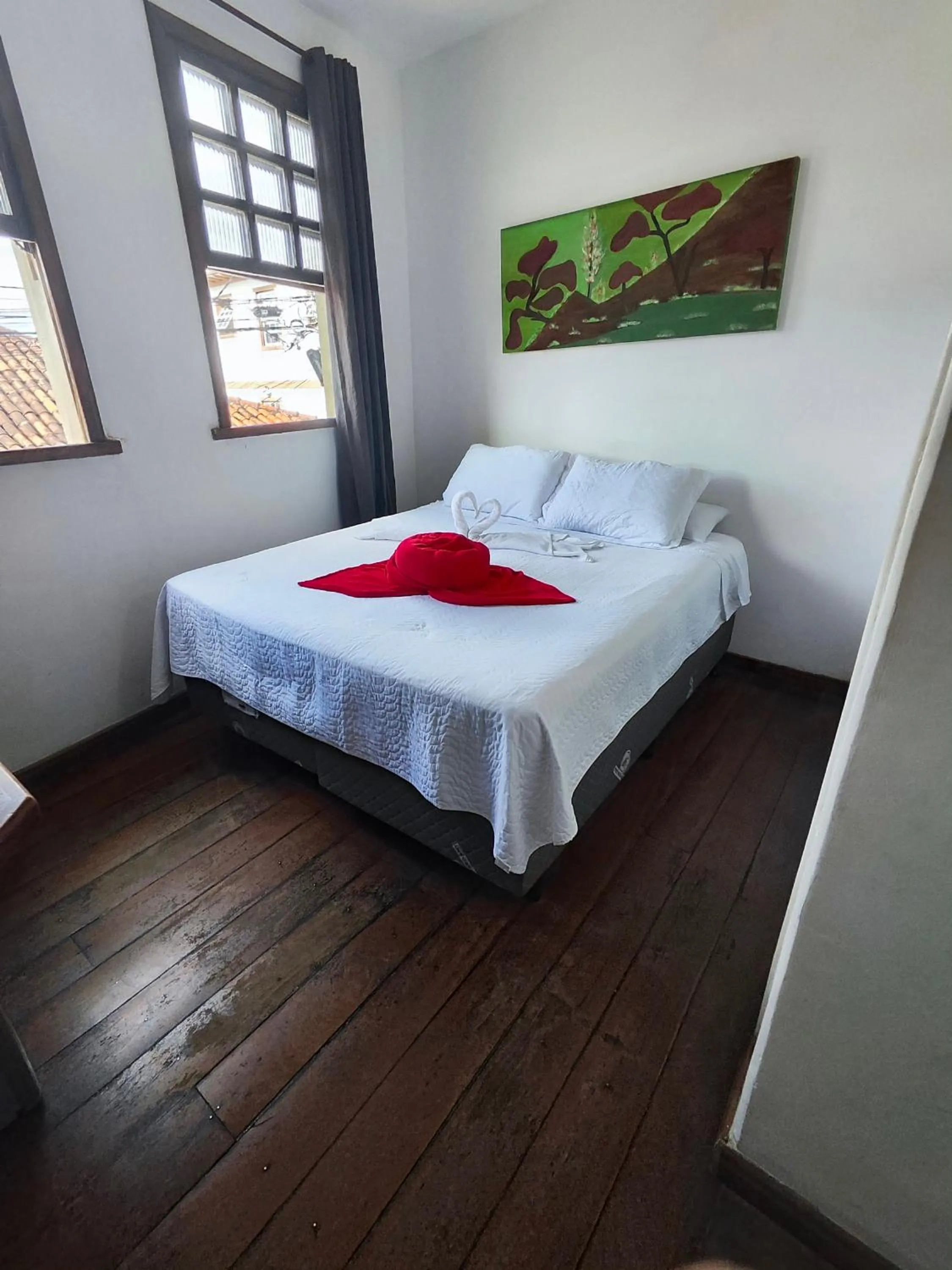 Bed in Pousada Flor de Lis