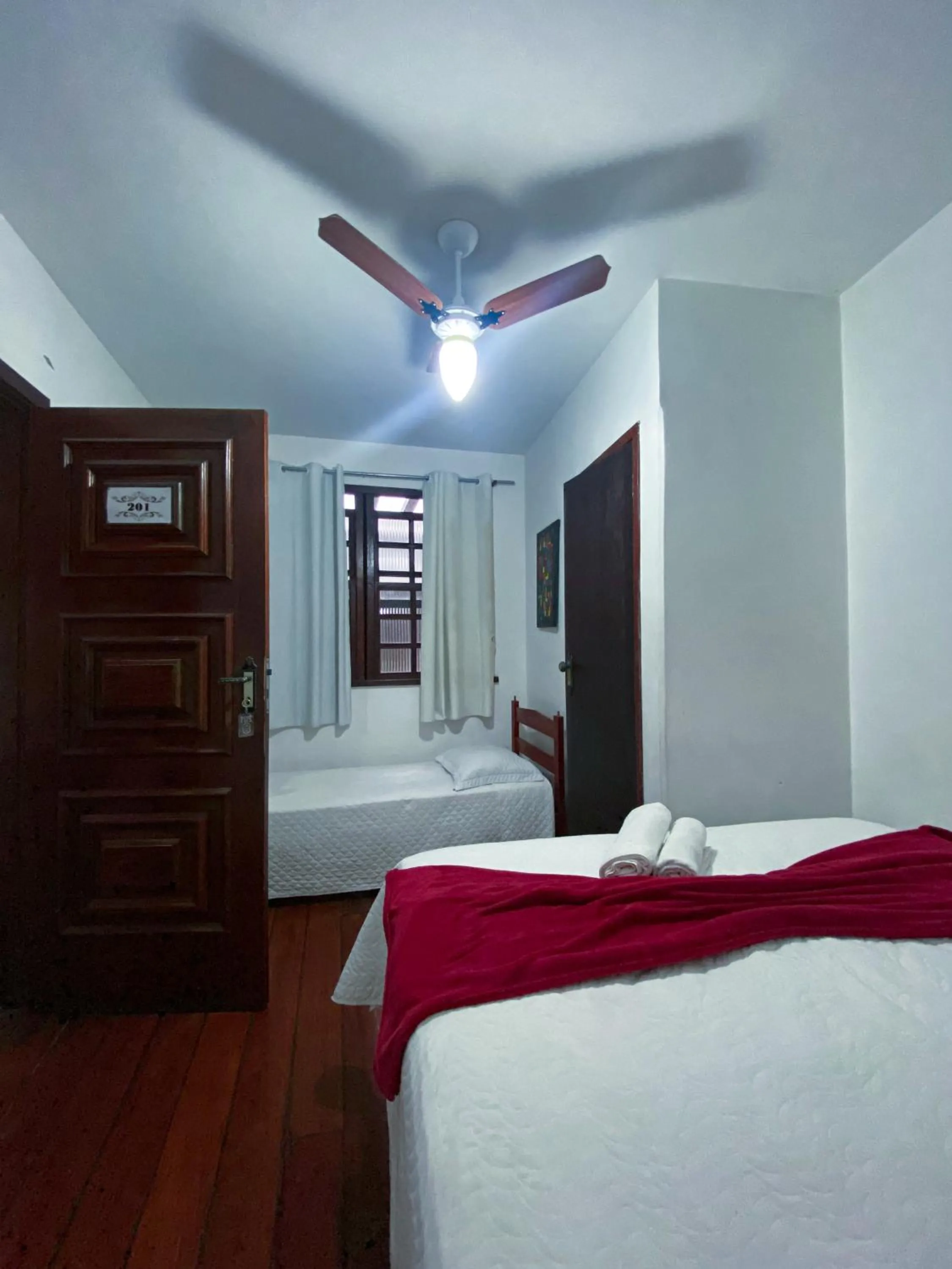 Bed in Pousada Flor de Lis