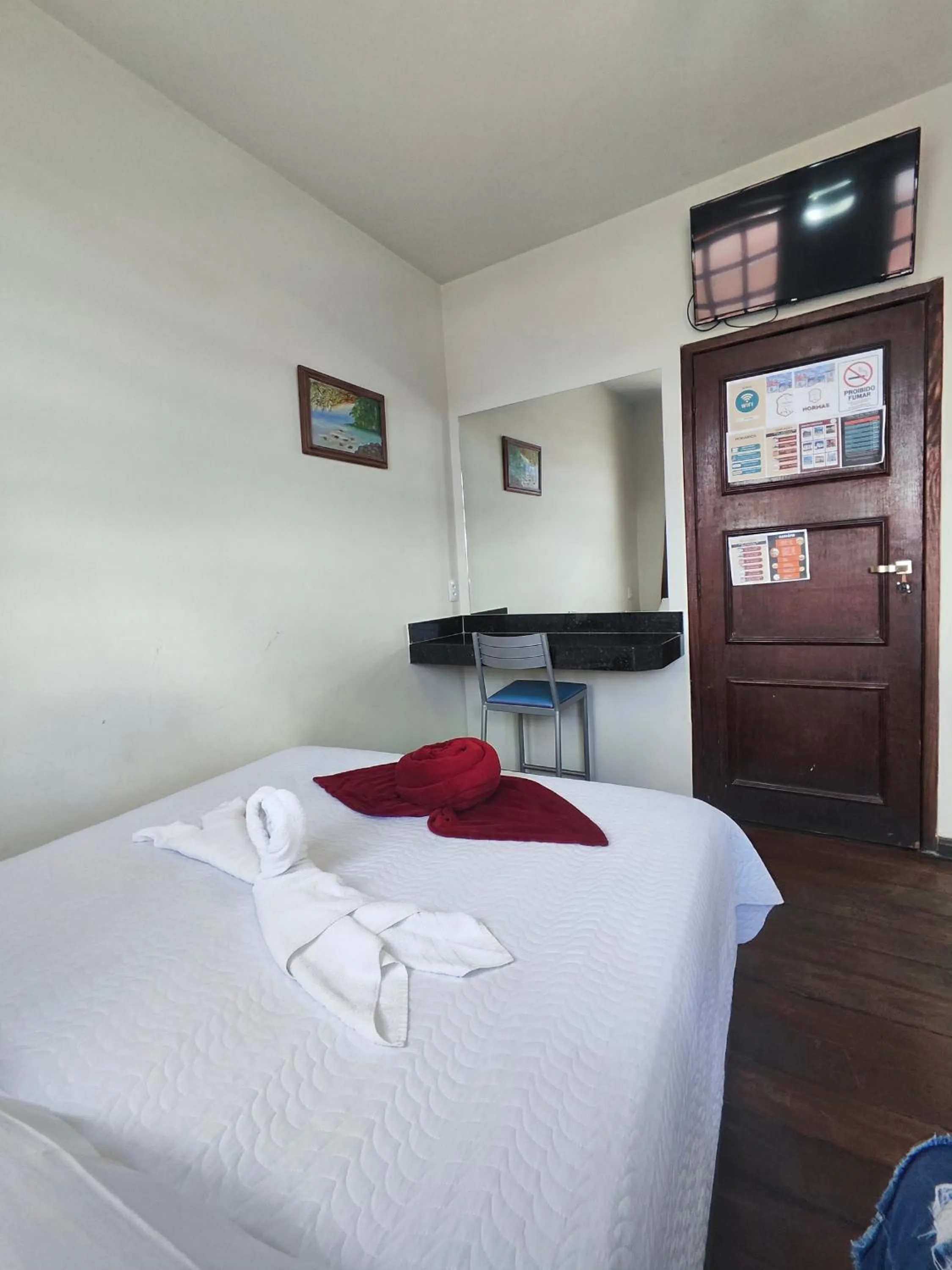 Bed in Pousada Flor de Lis