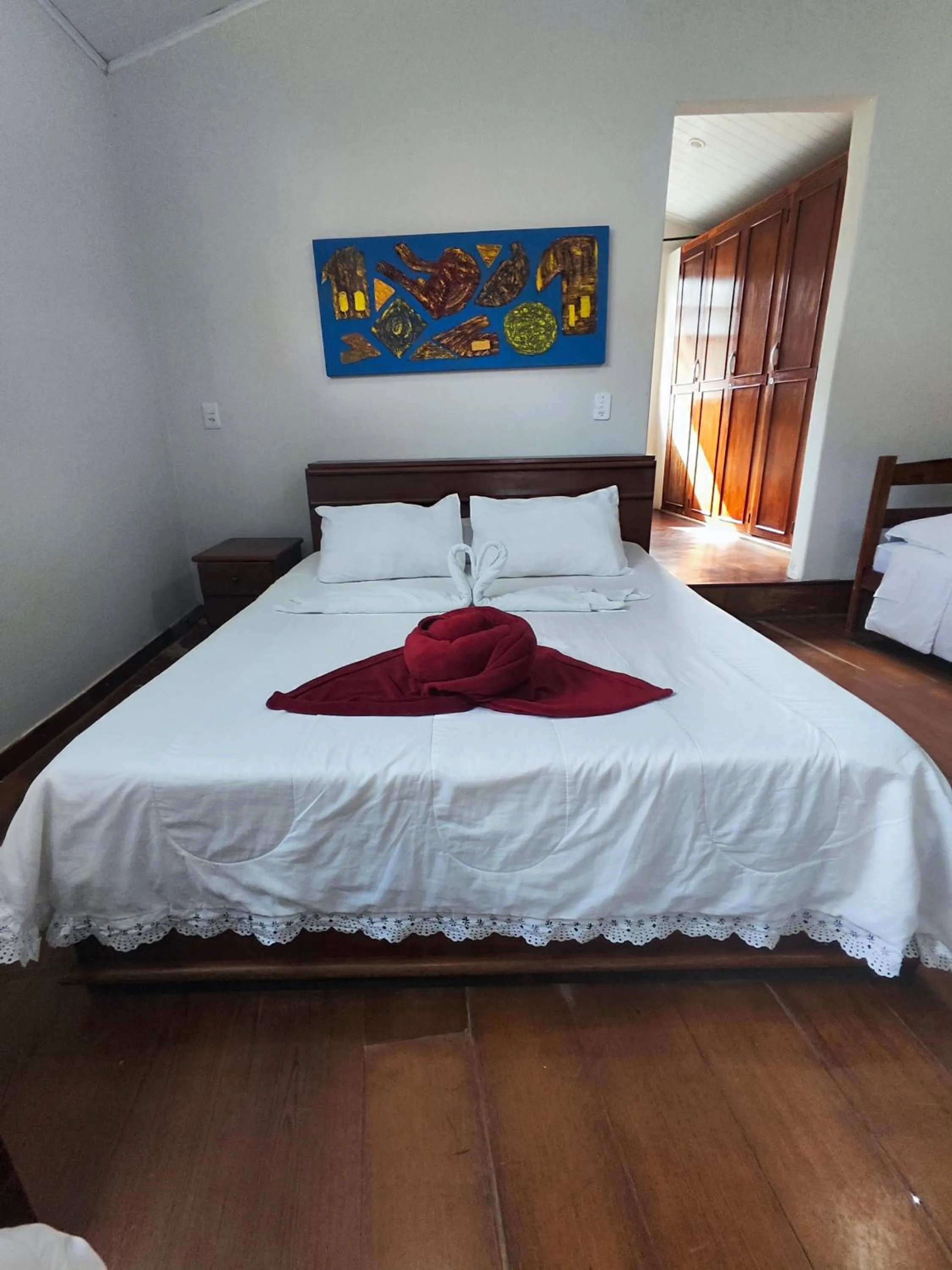 Bed in Pousada Flor de Lis