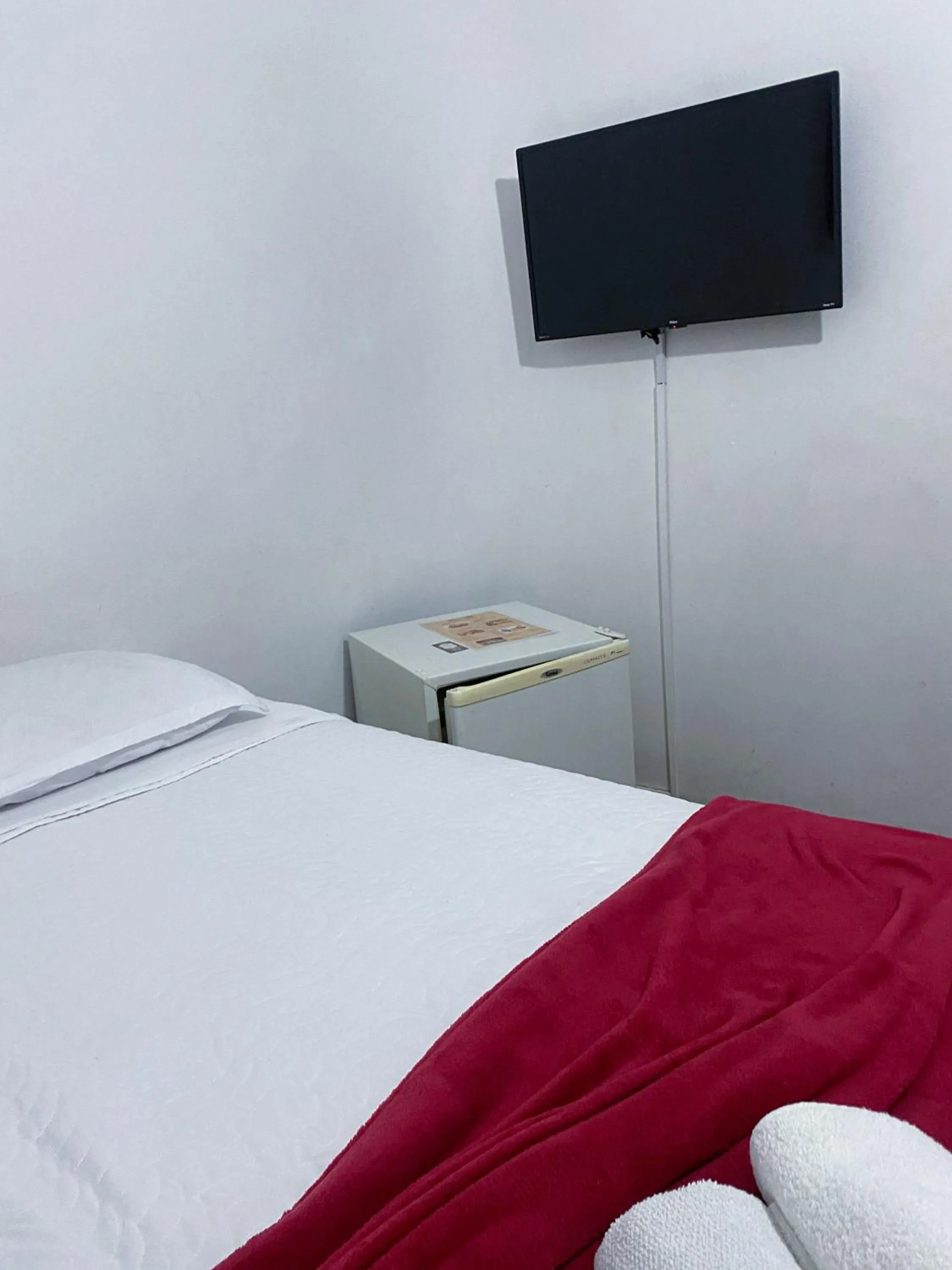 Bed in Pousada Flor de Lis